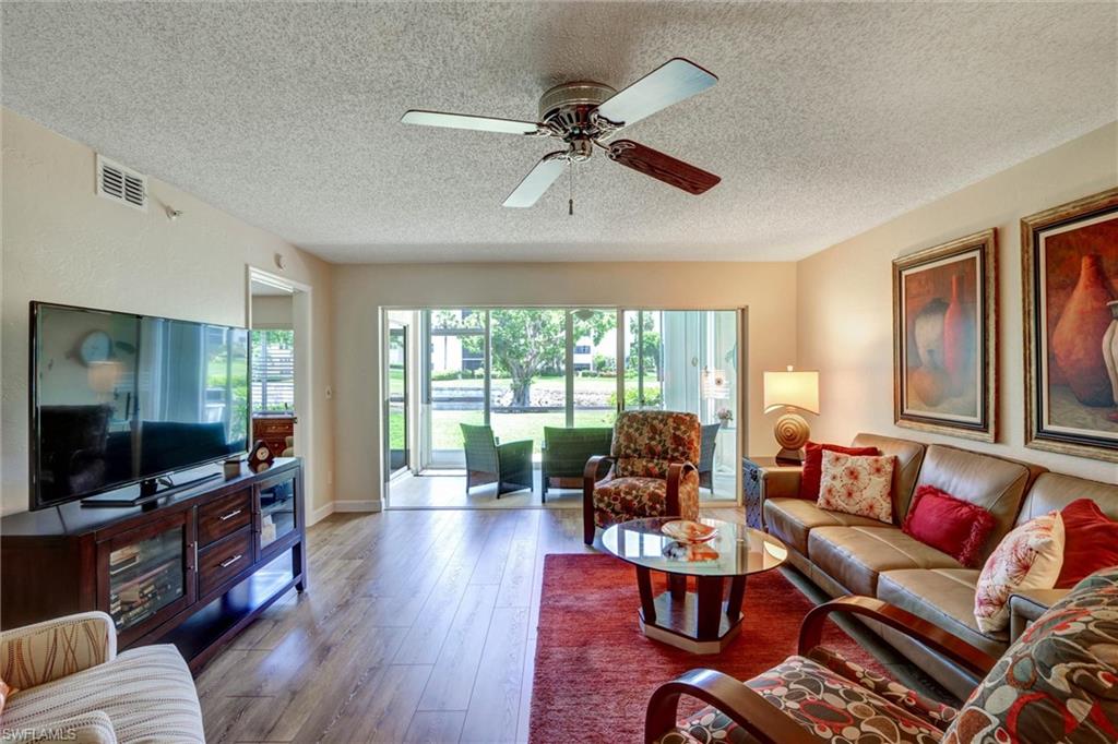 If you’re looking for comfort, convenience, and an unbeatable community lifestyle, this updated Sunset Cove exceptional value is for you!  First floor convenience, renovated kitchen, wood flooring throughout, enclosed lanai with lake and golf views.  Two split bedrooms and baths with spacious living and dining areas, providing great entertainment space. Turnkey!  Just steps to the village pool with BBQ patio, and your covered carport. 
The Landings is one of Fort Myers’ premier gated waterfront communities, offering an exceptional active lifestyle in a prime location. Residents enjoy an 18-hole executive golf course, 13 lighted Har-Tru tennis courts, 8 pickleball courts, bocce, a fitness center, walking paths, and a Junior Olympic resort and lap pool. Boating enthusiasts will appreciate the 192-slip deep-water Gulf access marina, with dry dockage also available. With lush mature landscaping, a waterfront picnic area, on-site dining, and a vibrant calendar of social activities and entertainment, every day here feels like a getaway.
