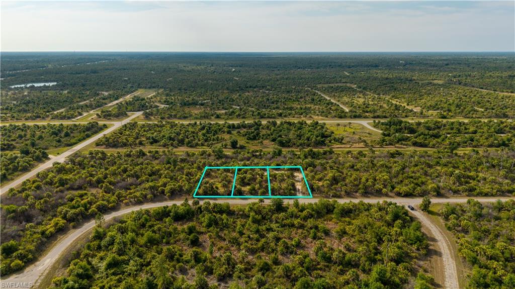 UNIQUE OPPORTUNITY: Purchase all THREE ADJACENT LOTS together for approximately 0.69 ACRES, creating the PERFECT SETTING to build a PRIVATE ESTATE, LUXURY CUSTOM HOME or exceptional INVESTMENT PROPERTY in growing North Port! :) Discover an INCREDIBLE OPPORTUNITY to BUILD YOUR DREAM HOME in beautiful North Port, one of SWFL GROWING COMMUNITIES! ***BONUS OPPORTUNITY: The TWO ADJACENT RESIDENTIAL VACANT LOTS at 8607 & 8608 are ALSO AVAILABLE FOR SALE, creating an EXCEPTIONAL TRIPLE-LOT OPPORTUNITY for expanded privacy, a larger estate build, or future investment potential!*** This 0.23-acre RESIDENTIAL VACANT LOT offers the PERFECT CANVAS to create your CUSTOM FLORIDA RETREAT in true SWFL PARADISE! Located in desirable ZONE X, this property requires NO FLOOD INSURANCE upon construction, adding exceptional VALUE & PEACE OF MIND for future homeowners & investors alike! This SPACIOUS 80x125 RECTANGULAR LOT features approximately 10,000 sq ft of land, offering ENDLESS POSSIBILITIES for designing your IDEAL HOME with room for a POOL, tropical landscaping, outdoor kitchen, expansive patio, garden oasis & ENTERTAINING AREAS. Once CLEARED, this lot is READY TO BUILD, making it easier to bring your DREAM HOME VISION to life! Enjoy highly desirable NORTHWEST REAR EXPOSURE, creating the PERFECT SETTING for relaxing Florida evenings, BEAUTIFUL SUNSETS & a welcoming outdoor atmosphere year-round. Whether you envision a CONTEMPORARY RESIDENCE with expansive windows & modern architecture or a PRIVATE TROPICAL ESCAPE surrounded by lush landscaping, this property offers both PRACTICAL & AESTHETIC ADVANTAGES for your future build. Conveniently located with EASY ACCESS to I-75, allowing quick travel NORTH to Venice, Sarasota, Tampa & Orlando or SOUTH toward Punta Gorda, Fort Myers, Bonita Springs, Naples & Marco Island. Punta Gorda Airport is approximately 13.4 miles away, while Southwest Florida International Airport is approximately 46.8 miles away, making travel & commuting exceptionally convenient. DON’T MISS this RARE OPPORTUNITY to secure a VALUABLE PIECE OF LAND in a PRIME LOCATION! Whether you are looking to BUILD YOUR FOREVER HOME, a SEASONAL RETREAT, or INVEST FOR THE FUTURE, this property offers AMAZING POTENTIAL in one of SWFL’s most desirable growth areas!