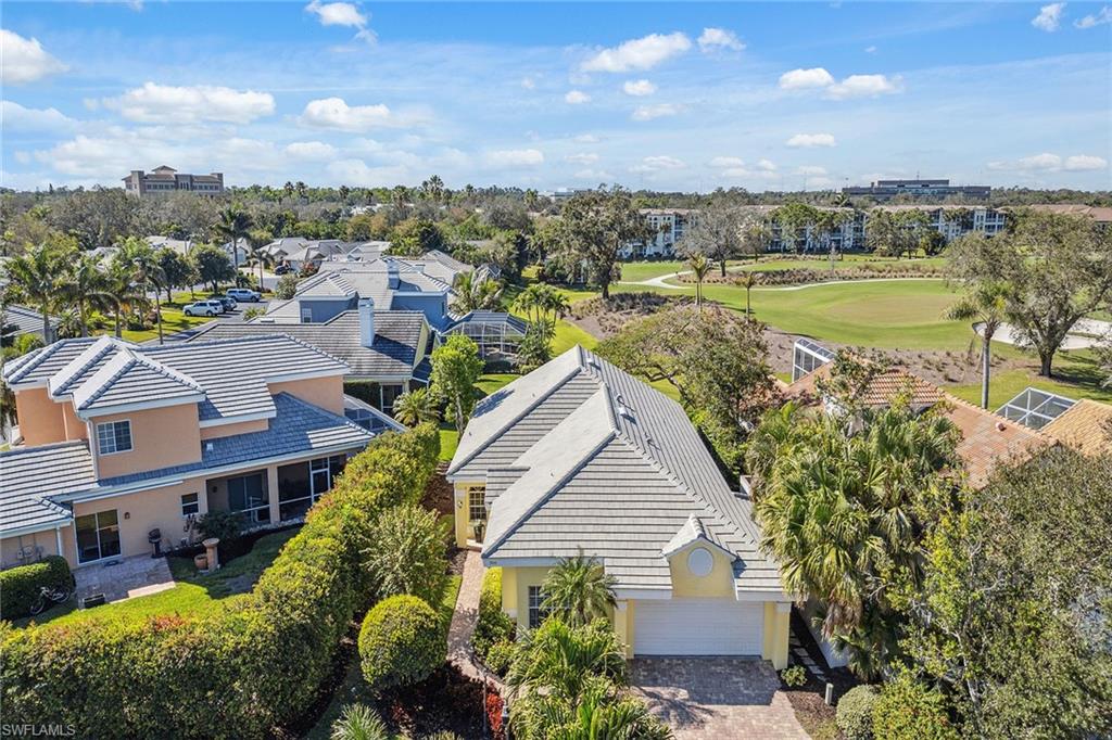 As you turn onto Silver Oaks Drive, majestic oak trees lining both sides of the street create a peaceful, welcoming atmosphere. Nestled in complete privacy, this one-of-a-kind home is a hidden gem. Thoughtfully renovated with exceptional attention to detail, the home features a stunning state-of-the-art kitchen with premium appliances, beautiful new flooring throughout, a new washer and dryer, a new garage door, an upgraded guest bath, stylish new light fixtures and a new hot tub on the lanai. Overlooking the Vineyards South Golf Course, this exceptional property enjoys a premier location and is the only home on the right side of Fountain Circle, offering unmatched privacy and breathtaking views. Living in this gated community offers many options, such as getting outside along the landscaped Arbor Boulevard, or joining the Vineyards Country Club, which has two championship redone golf courses, a state-of-the-art Wellness Center, tennis, pickleball, bocce, two swimming pools and dining. Please come and see this charming home.