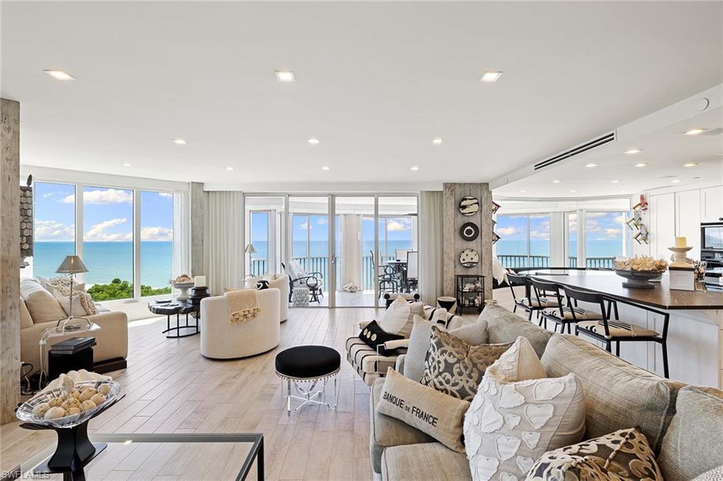 Enjoy year-round stunning sunsets in this 7th-floor condominium at exclusive Contessa at Bay Colony. With over 2,100 square feet of thoughtfully renovated and decorated living space, this condominium features an open floor plan with 2 bedrooms and 2.5 baths, wet bar area, plank tile throughout, Wolf and Sub-Zero appliances, large lanai with direct views of the Gulf of Mexico. Both bedrooms have a screened lanai with ocean views. Contessa's lobby, social room and fitness center were renovated in 2022. The fitness center boasts top-of-the-line equipment and a separate pilates room. Enjoy relaxing in a lounge chair or take a water aerobics class in Contessa's saltwater pool, which is just steps away from direct access to a private beach area. Bordered by mangroves, Contessa has a private tennis court, outdoor fireplace and a grilling area. The building has a 24-hour staffed front desk and a full-time resident manager. Bay Colony residents have exclusive access to a private beach club and tennis club in addition to all amenities of Pelican Bay, including three oceanfront dining clubs, tennis club, fitness club, 2 miles of beaches, miles of nature trails, bike paths and canoeing.
