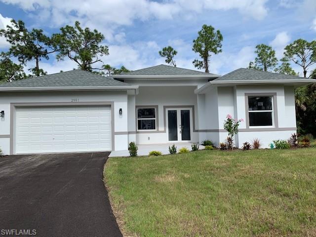 Completion estimated at between September 30- October 15!!!  NEW CONSTRUCTION in Golden Gate Estates! Situated on over one acre of land and surrounded by Old Florida natural landscaping, this single family home is being built with integrity and features a great room & split bedroom layout, French door front entry, 4 guest rooms & 3 full baths, volume & coffer ceilings, beautiful 20x20 tile throughout, breakfast bar & dining area, rear lanai, and a 2 car garage. This property offers a country setting with more than enough room for the entire family to have personal space and still have room for all of your toys. Go under contract before drywall goes up & you will be able to customize home by selecting certain building options. There is plenty of room to put in a pool if desired, as well as room for a detached workshop/pole barn. Great upcoming location, with being right down the road from one of the fastest growing cities - Ave Maria - and having easy access to I-75.