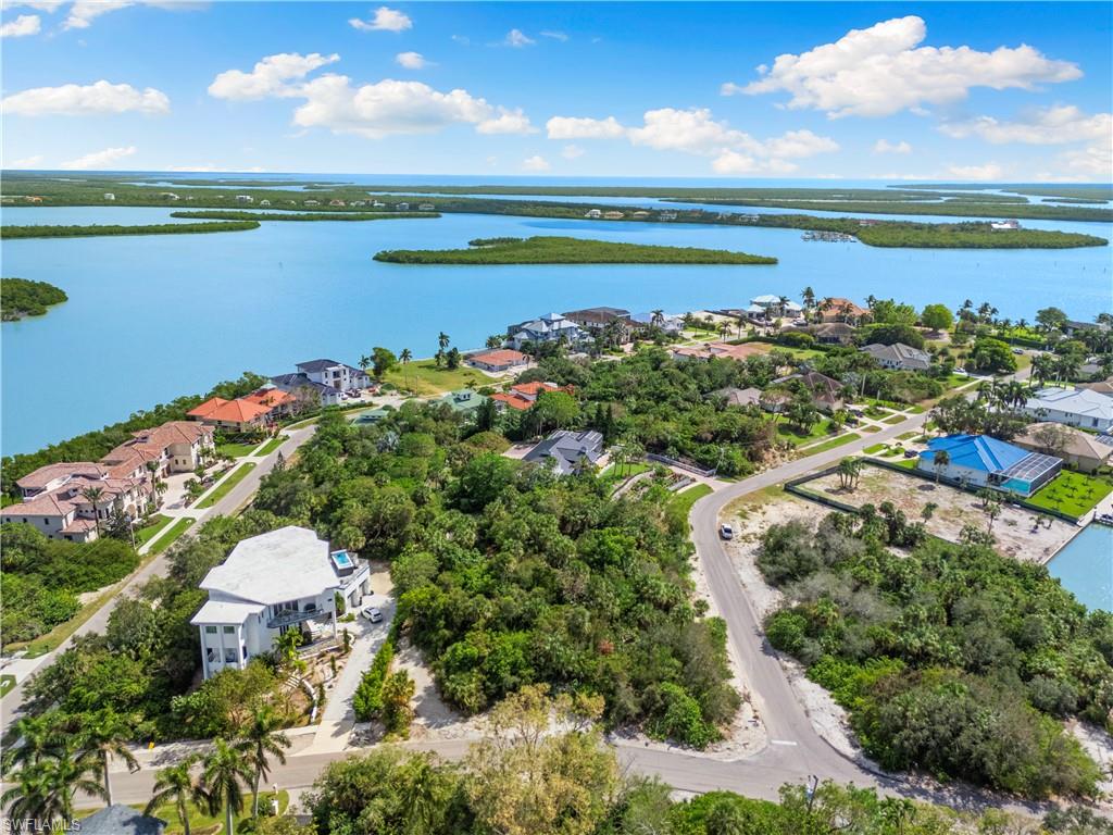 Discover the perfect opportunity to build your dream home on Marco Island's Indian Hill, nestled in one Southwest Florida's highest points, offering 51 feet above sea level. Located at 1130 Caxambas Drive this oversized vacant lot provides breathtaking 360-degree views. Surrounded by Marco Island's friendly community and renowned white sandy beaches. You will enjoy the pinnacle of luxury living with this investment.