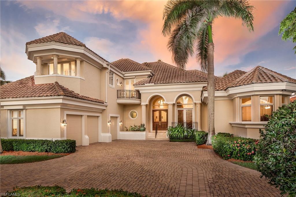 Nestled on the bank of Cutlass Cove on prestigious South Gordon Drive, this lovely four-bedroom-plus-den home offers deepwater dockage, easy Gulf access by boat, access to the private Cutlass Cove beach club across the street and eligibility for Port Royal Club membership. The beautiful retreat boasts a ground-level master suite, great room and open kitchen and family room. Walls of windows in the main living area offer stunning, unobstructed water views. Ample windows in both the kitchen and dining room bring the outdoors in by framing the property’s lush foliage. Surrounded by substantial space for sunning and outdoor dining, the comfortable, shaded patio is complemented by a large lap pool and spa. Freshly painted and newly carpeted, the sparkling home also offers high ceilings, large windows, gas fireplace, finely crafted built-ins, pool bath and three-car garage. With its idyllic location and the finest beach, boating and club opportunities available, this would be the perfect Port Royal residence to call your home.