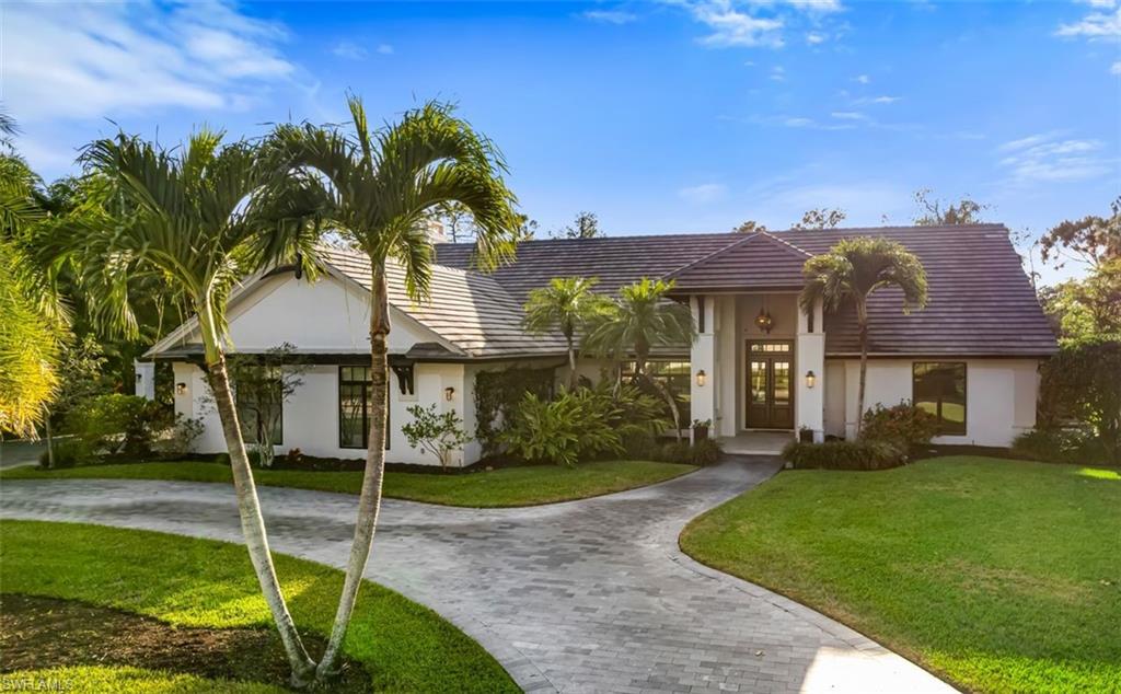 Significant price drop on this stunning home that was fully remodeled from the studs in 2016/17. It features an open floor plan great room and kitchen area with dining, along with entry foyer living and formal dining areas. The home opens to the outdoors for flowing indoor/outdoor living. Glistening salt water pool and spa with waterfall feature, heated by gas. The kitchen has Miele appliances and a gas stove, quartz countertops and Irpinia cabinets. Sonos sound system in all main areas including the main bedroom and outdoors. Lutron lighting system can be automated to your preferred time settings. The garage is cooled by one of three AC units. Impact glass throughout, including the front door. Walls and ceiling have blown in insulation to keep the home cool and electrical costs low. The rear offer offers stunning sunsets over the golf course and lake. The addition of a gazebo with outdoor kitchen and pool bath provide an ideal space for gathering and al fresco dining. Optional membership levels with the Quail Creek Country Club are available. (Garage has large door for 2 vehicles and one small on for a golf cart. Overall garage space can hold 3 full sized vehicles. One of the four bedrooms is currently being used as a study.) Inventory list is attached. Home is built to current hurricane code and incurred no damage during hurricanes Irma and Ian.