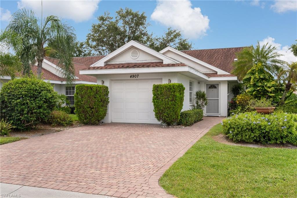 Welcome to resort-style living in the gated community of World Tennis Center, ideally located in central Naples just minutes from Gulf beaches, Waterside Shops, Mercato, and Fifth Avenue South. This beautifully maintained, optional turnkey furnished, single-story, 3-bedroom, 2-bath home offers long lake views and desirable southern exposure. The bright, open floor plan features high ceilings, open living area, and sliding glass doors to an extended screened lanai.  Recent updates include a 2025 whole house replumbing, new kitchen appliances, fresh interior paint, 2020 HVAC, 2015 roof, impact-resistant windows (2006), and Rolsafe aluminum hurricane shutters on the lanai for added storm protection. Located in FEMA Flood Zone X. World Tennis Center offers an exceptional amenity package featuring 14 championship Har-Tru clay and hard tennis courts, pickleball, bocce, basketball, two heated pools and spa, saunas, locker rooms, a clubhouse, poolside/courtside café, fitness center, scenic walking paths, and an active social calendar. The full-service pro shop coordinates tournaments, clinics, private lessons, and social events for players of all skill levels. Whether you're looking for a full-time residence, seasonal retreat, or investment opportunity, this move-in-ready home offers an exceptional combination of location, lifestyle, and value. Spectacular long lake views, a spacious south-facing lanai, updates, a location within the highly acclaimed Collier County Public School District, and outstanding community amenities make this a rare opportunity in the heart of Naples. *Patio photo is virtually staged.