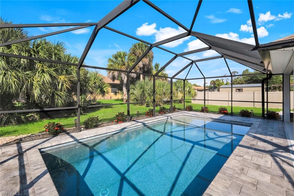 Built in 2019 by Adams Homes, this well-maintained 3-bedroom + den, 2-bath pool home offers a functional split floor plan with nearly 1,900 square feet of living space. The open-concept layout is ideal for everyday living and entertaining, with a spacious kitchen featuring stainless steel appliances, ample cabinet space, and a breakfast bar overlooking the living and dining areas.

The spacious primary suite features dual walk-in closets, dual sinks, and a walk-in shower. Two guest bedrooms and a versatile den provide plenty of space for family, guests, or a home office.

Step outside to the screened pool and covered lanai, perfect for relaxing or entertaining year-round. Conveniently located just minutes from US-41, you'll enjoy easy access to shopping, dining, parks, golf courses, medical facilities, and everything Port Charlotte and nearby Punta Gorda have to offer.

Whether you're looking for a primary residence, seasonal getaway, or investment property, this move-in-ready home is ready for its next owner.
