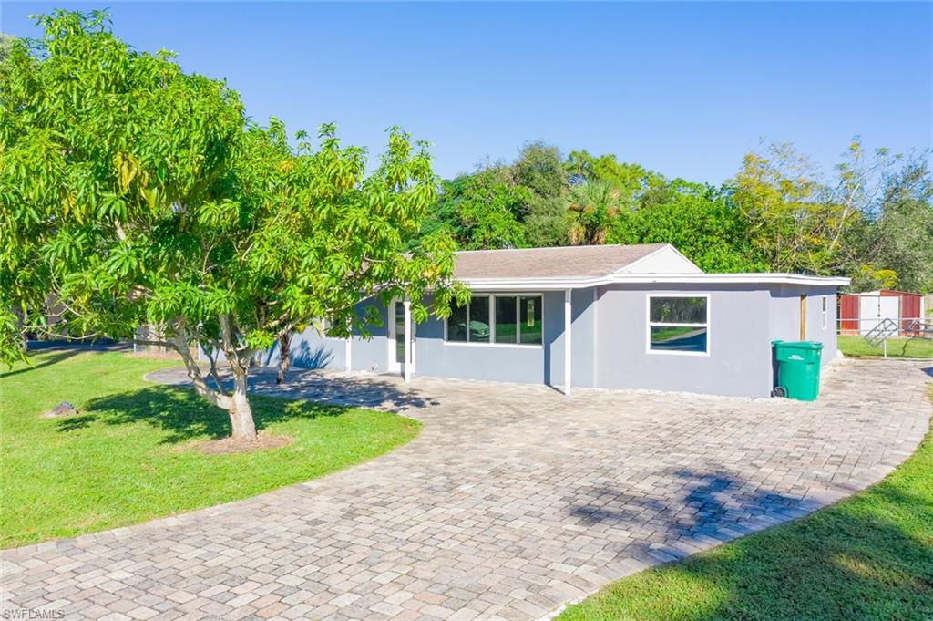 Welcome home to this great starter or income potential property. Updated interior includes granite, contemporary backsplash, new floors and more. The open beam ceiling has a real wow factor. Large yard if fully fenced and the wide side gate allows easy access and storage for all the toys! Possibilities of expansion as the carport has been fully enclosed and is plumbed for a full bath. Open the wall to add a great master space or finish and use side entrance for a full guest suite. Agents please see remarks