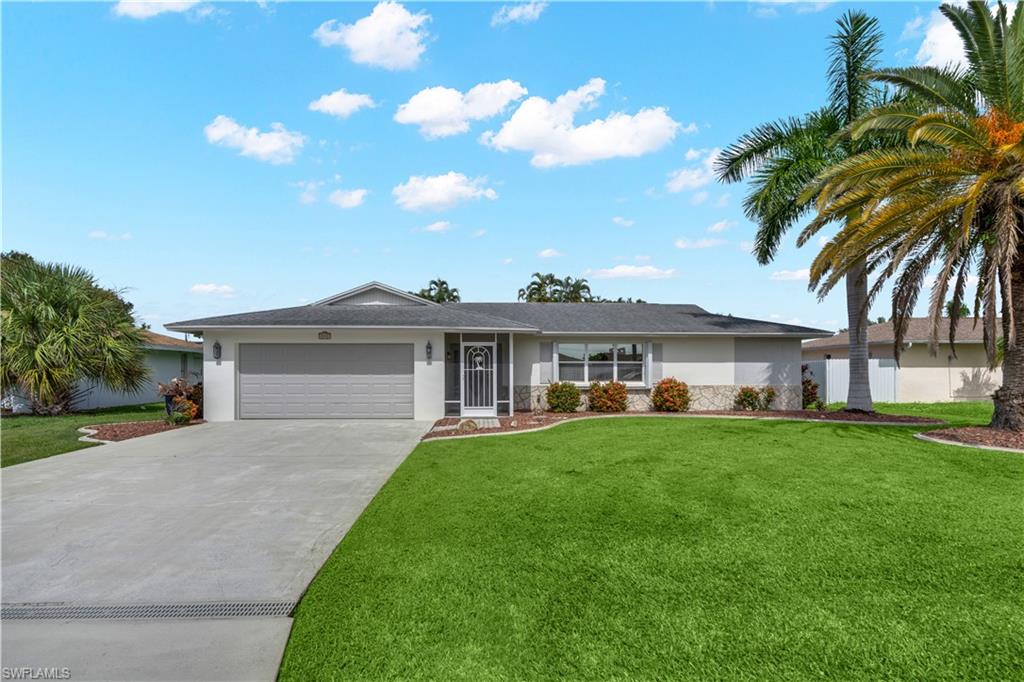 Welcome to this beautifully updated 3-bedroom, 2-bathroom pool home offering 1,680 square feet of living space in the heart of Southeast Cape Coral. Ideally located just minutes from shopping, dining, entertainment, parks, and everything Cape Coral has to offer, this move-in-ready home combines quality upgrades with great indoor/outdoor living.

Inside, you’ll find a formal living room, formal dining room with direct access to the lanai, and an additional family room that provides the perfect flex space for entertaining or everyday living. Tile flooring runs throughout the main living areas, while the bedrooms feature wood laminate flooring...there is no carpet. Plantation shutters throughout add timeless style and privacy.

The kitchen is beautifully appointed with KraftMaid cabinetry, a farmhouse sink, pantry, electric cooktop, microwave, and a new stainless steel appliance package including a double wall oven, refrigerator, & dishwasher..

The spacious primary suite features a walk-in closet, single vanity, walk-in shower, and private double-door access to the lanai and pool. Two guest bedrooms are located on the opposite side of the home, along with a guest bathroom featuring a tub/shower combination and convenient pool access.

Step outside to your private Fully fenced in backyard featuring a spacious covered lanai with new tile, outdoor TV area, and a deep heated saltwater pool with a new salt cell and new pool cover. The pass-through bar from the kitchen makes outdoor entertaining effortless.

Major updates include fresh interior paint in the main living areas and exterior paint, a 2025 Ruud two-stage A/C system, a 2021 water heater, new stainless steel appliances, both toilets replaced, and a fully fenced backyard. Storm protection is equipped with accordion hurricane shutters on every window plus two electric roll-down hurricane screens on the lanai.  Best of all, all City of Cape Coral utility assessments are paid, providing significant savings to the next owner.

This meticulously maintained home offers exceptional value, quality upgrades, outstanding storm protection, and an unbeatable Southeast Cape Coral location. Schedule your private showing today!