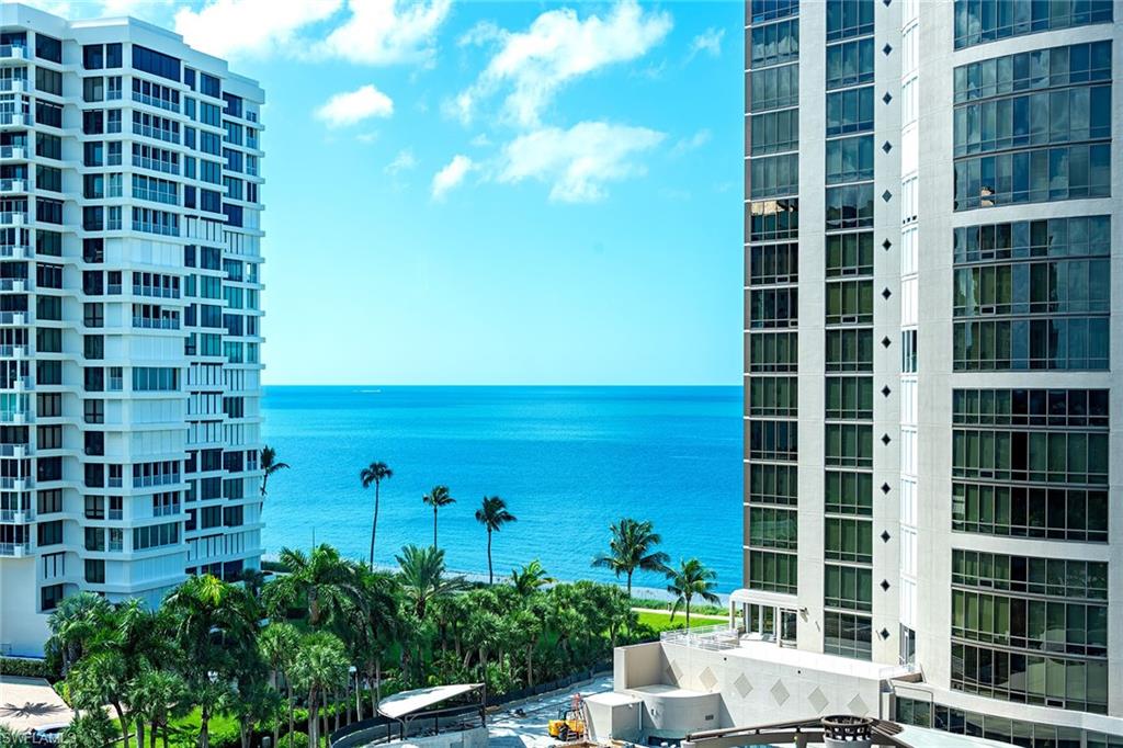 Enjoy southwestern views of the Gulf and bay from this 10th-floor corner residence at Monaco Beach Club. Lovely light streams throughout this two-bedroom, two-bath home with over 2,000 square feet of living area including a spacious living room with bar, primary bedroom with an updated bath and two walk-in closets, eat-in kitchen plus dining space and nicely-sized guest suite. Some of the additional features are floor-to-ceiling windows in the living room, a spacious lanai plus a private lanai off the primary suite and an oversized laundry room with storage. Monaco Beach Club is a wonderfully maintained, Gulf-front building and offers amenities including 24-hour secured gated entry, 24-hour front desk attendant, renovated lobby and common areas, social room, fitness room, two tennis courts, pool area with four gas grills and on-site manager. Stroll along the Park Shore Promenade or across the street to Venetian Village for shopping, dining and entertainment. Boat docks are available for lease or purchase (based on availability). The feeling of a home with convenience of condominium living!