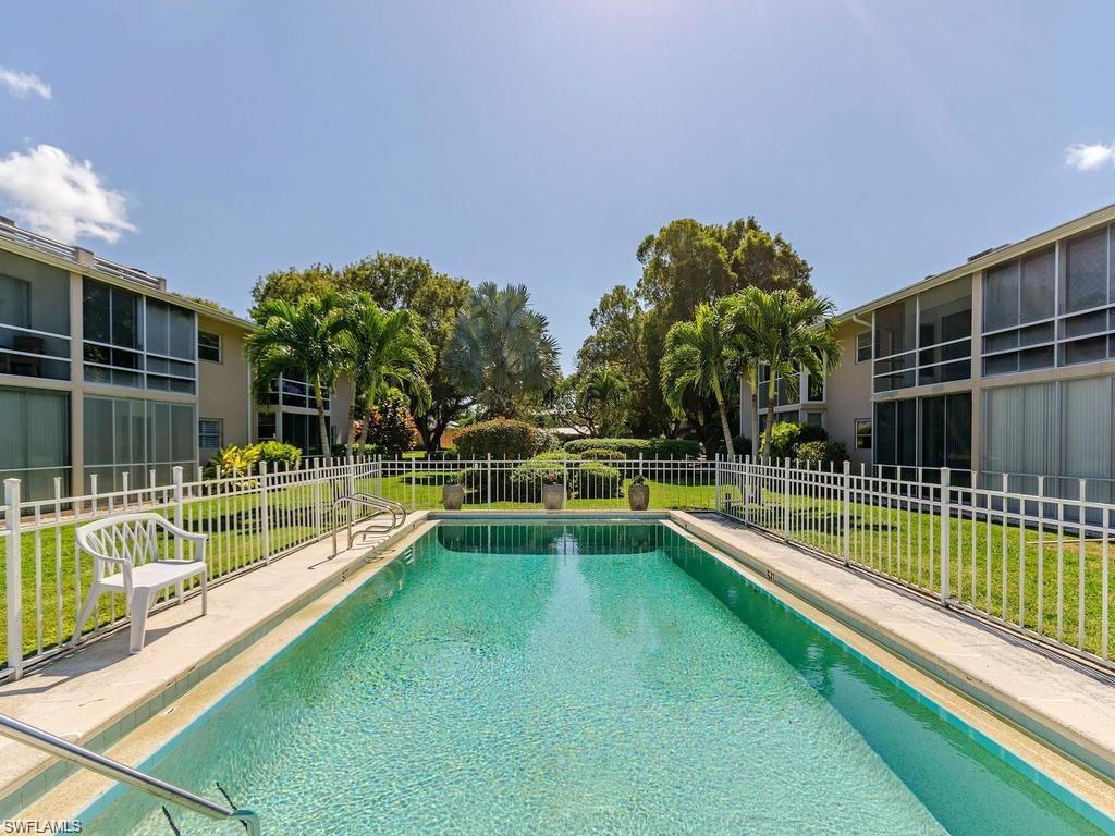 Boaters dream !Rarely available ground floor 2/2 waterfront condo with gulf access !This immaculate beach cottage style condo is perfect for year around residence ,seasonal get-a-way, 2nd home or profitable rental.Light open tropical feeling, directly on canal front seawall with picturesque waterfront views . Only 16 residences, low monthly fees, very private, beautiful heated swimming pool. Just a few minutes walk or bike to 5th Avenue, Pier, Old Naples and Beach,Tin City this value is unmatched by any other waterfront property in Naples.The large open dining room/living room  two separate large bedrooms with  lots of closet space. Outside storage room, common laundry, brick-paved parking lot, large pool, and courtyard area. No boat dock conveys with unit, but several are available for rent at this time -slip can be leased for $100 per month for boat up to  27'.No bridges to gulf. Close to Tin City, Old Naples and downtown area, and just a bike ride to the beach and  right out into the Gulf thru Gordon pass, and the location is only steps from 5th avenue and the beach for those who enjoy walking or biking.