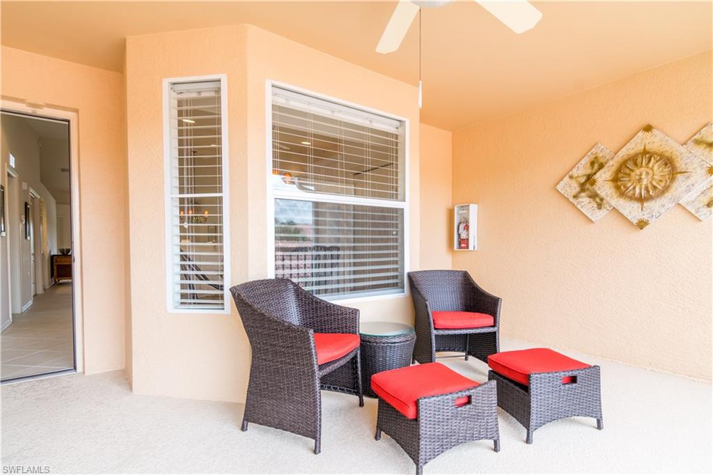 Spectacular long LAKE VIEW. Beautiful corner unit.  Very short walk to the pool.  Garage with additional attic storage.   2 bedroom, 2 bath plus den with large screened lanais front and back! Ceiling fans in all rooms.  Plantation shutters and blinds.   Golf equity is included with this purchase.  Newly renovated golf course and club house that showcases 2 restaurants, outdoor dining, bar and meeting rooms.  Brand new pro shop, locker rooms, fitness center, putting green and range.  Multiple pools, hot tubs and lighted tennis courts.  LOCATION, LOCATiON! Close to many shopping and dining venues.  Only 4 miles from award winning Naples Beaches.  Easy access to I75 and Fort Myers airport. Don't miss this opportunity, make an appointment today!