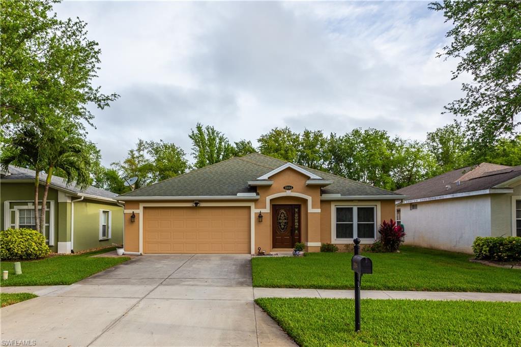 Centrally located single family home in the highly desirable community of Indigo Lakes. Four bedrooms, two bathrooms with an open floor plan with expansive views. The home has a large kitchen with Stainless Steel appliances, plenty of counter space perfect for  preparing food and entertaining. A convenient eating counter and nook provide additional eating areas. There is also a formal dining room area and a huge living room with great views and open space. The master bedroom bath has been totally renovated with a new glass shower enclosure, custom marble flooring, tumble tile back splash, and a combination jetted tub.   The heating and air-conditioning system has been replaced recently. Additional upgrades to include wood flooring, designer lighting and fans, upgraded bathrooms and showers, granite flooring, enclosed lanai, and for privacy a fenced in back yard with Paver patio for a park like feel.   Only 15 minutes to the beach and 1 mile from I75.  Indigo Lakes offers several facilities , including club house, pool,  fitness center, tennis courts, basketball courts and playground. This is truly a gem, with high amenities &  low fees. FHA, VA OK.