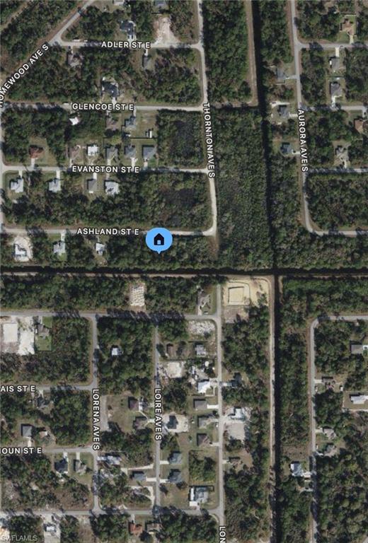 Amazing opportunity! Paved road and electric at the curb. Canal lot in Lehigh Acres, FL in a very desirable area close to East Lehigh School. Easy access to Lee Blvd through Sentinela, easy access to SR82 through Columbus. Buy now and clear to start building. Construction financing available. Seller financing available. Hablo Español.