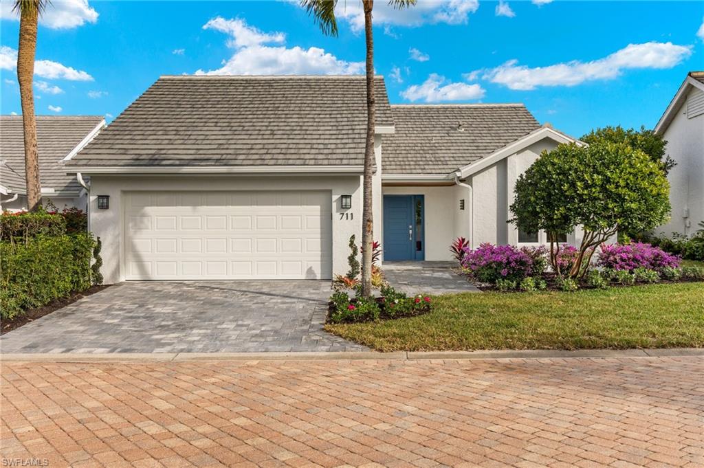 Completely remodeled single-family home in Pelican Bay! This X-Flood zone home has been renovated down to the studs by Blue Horizon Construction in collaboration with Van Eliza Design. This lake view pool home has 3 bedrooms +Den, 3 bathrooms, and all rooms are en-suite. Cristallo kitchen countertops and Bosch appliances make this kitchen a dream. With no expense spared this home features a new roof, new screen cage, newly resurfaced pool and deck, new PGT hurricane windows and doors, new paver driveway, new oak hard wood floors, wet bar with ice maker and sub zero drawers, custom furniture piece cabinetry throughout... Just a short walk to the Pelican Bay Golf Club or the Commons which will take you to the Pelican Bay Private Beach Club.