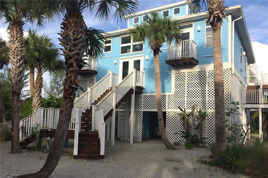 Your own tropical beachfront getaway awaits just minutes from Naples Bay or Marco Island. This home is miles away, yet close to everything needed. This is one of the widest, single parcels offered for sale. This home features 150 feet of beautiful pure white sugar sand frontage on secluded Keewaydin Island along the Gulf of Mexico. Easy access dock with boat lift along the Intracoastal Waterway. The three-bedroom, three-bath Floridian-style beach house is 100% sustainable with solar and generator power.