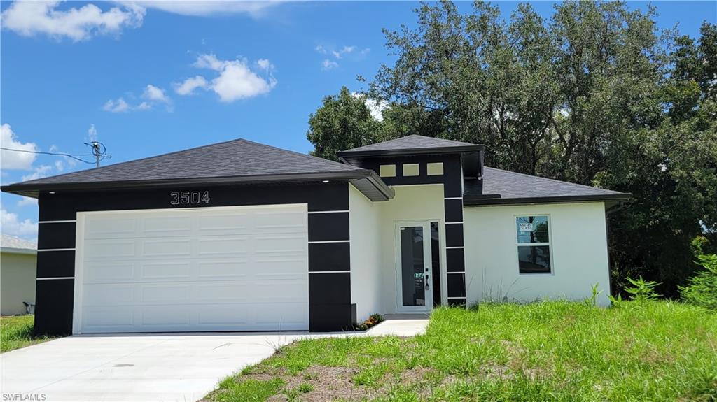 Be the first to own this stunning brand-new construction home in the rapidly growing community of Lehigh Acres! Designed with modern living in mind, this beautifully crafted single-family residence offers an open-concept floor plan filled with natural light, high ceilings, and premium finishes throughout.The spacious kitchen features sleek cabinetry, elegant countertops, and stainless steel appliances, flowing seamlessly into the living and dining areas—perfect for entertaining or everyday living. The generous primary suite offers a walk-in closet and a beautifully appointed en-suite bathroom, while the additional bedrooms provide flexibility for family, guests, or a home office.  Built with quality craftsmanship and energy-efficient features, this home combines style, comfort, and functionality. Enjoy a spacious backyard with plenty of room to create your dream outdoor oasis, add a pool, or simply relax in the Florida sunshine. Conveniently located near shopping, dining, schools, parks, golf courses, and major roadways, this home offers the perfect balance of peaceful living and everyday convenience. Whether you're a first-time homebuyer, growing family, or investor, this exceptional new construction is an opportunity you won't want to miss. Schedule your private showing today and experience everything this beautiful new home has to offer! Ask about $15,000 toward Buyer's closing costs!! MOTIVATED SELLER...Easy to show!!