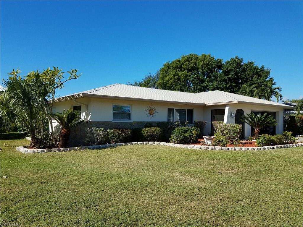 This spacious home situated on a double lot is located on the south end of Fort Myers Beach in the great beach community of Laguna Shores...away from all the traffic.  This community has mostly owner occupied homes, however, it is also a great rental community.  In 2015 a pool with paver patio was added and the back of the property has been fully fenced.  Real easy to show.  Newly renovated with new tile throughout, new stainless refrigerator, microwave and range....with beautiful glass back splash and granite countertops.  This property is in need of NOTHING ..... move in immediately....or start renting it out.  Walk to one of the best beaches on Ft. Myers Beach or take a very short ride to Lovers Key State Park.