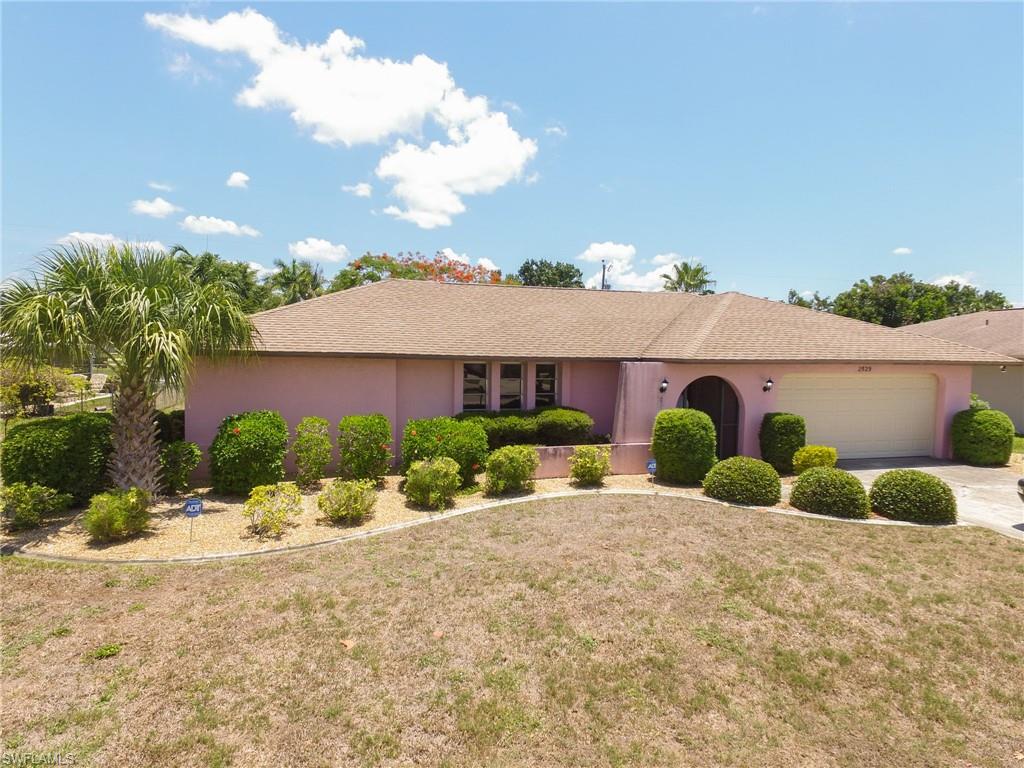 Over 1800 Sq Ft home located close to Veterans parkway in the heart of Cape Coral! This home is conveniently located to dining, shopping, and entertainment. The back yard is currently partially fenced. The home boasts a split floor plan, a spacious kitchen that opens into the family room, and a separate/family living room that can also be used as a dining room

The City assessments are paid. There is plenty of room to add a pool. The 2nd bathroom has an exterior door that would allow it to be a pool bath if one was installed. Come see for yourself and make an offer!


Two sets of sliders head out to the screened lanai. Mandatory flood insurance is not required.