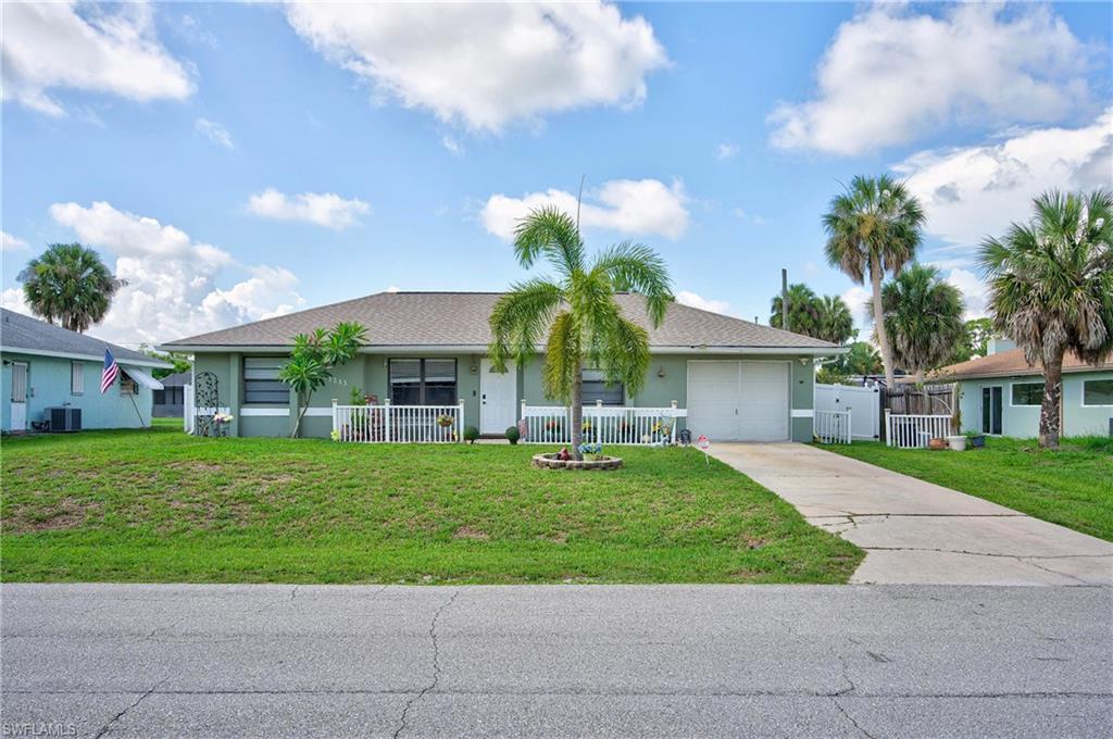 Welcome to your Florida retreat! This charming 3-bedroom, 2-bathroom home with a 1-car garage is perfect as a full-time residence, seasonal getaway, or investment opportunity. Step inside to vaulted ceilings that create a spacious feel, complemented by laminate flooring installed in 2022. The desirable split-bedroom floor plan offers privacy, with the primary suite separated from the guest bedrooms. The galley-style kitchen features a convenient pass-through window and breakfast nook overlooking the spacious backyard and swimming pool. Enjoy Florida living from the screened lanai overlooking the desirable south-facing backyard, perfect for relaxing, entertaining, and soaking up the Florida sunshine. The fully fenced backyard features 6-foot vinyl privacy fencing, a 10’ x 10’ storage shed, and two new backyard floodlights added in 2026. Additional updates include a new roof in 2021, fresh interior and exterior paint in 2022, garage epoxy flooring completed in 2022, interior laundry room, and automatic garage door opener. Conveniently located near shopping, dining, public boat ramps, kayak launches, and everything Southwest Florida has to offer. Start enjoying the Florida lifestyle today!