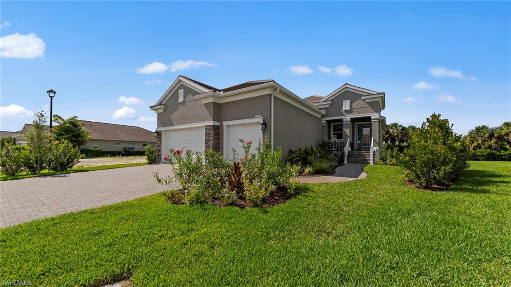 New Home by Neal Communities in Verandah. This beautiful BRIGHT MEADOW floor plan has 2288 SF, 3 bedrooms, den, 2.1 baths, 3- car garage, spacious center island, designer Chef’s Kitchen, wall oven, 42”  cabinets with quartz counters, designer backsplash, undermount lighting and upgraded tile floors. Impact windows/doors, 8-ft doors, pocket sliders, coffer ceilings, and a beautiful lanai.  This private golf course community offers 36 holes of championship golf (optional membership), 9 miles of trails and board walks, kayaking along the Orange River, dog park with covered areas, playground, fitness center, 24/7 manned gated entrance. Close to shopping, restaurants and bank. Lawn maintenance, basic cable and internet are included.  This home is built on Homesite 8008 and is READY NOW! The photos are not an exact representation of this feature home.