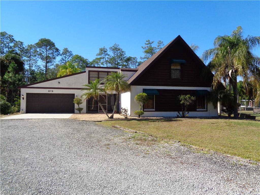 This home's design is unique yet roomy and desirable for the one who appreciates uniqueness. The kitchen, living room, two bedrooms, and bath are on the first floor and on the 2nd floor is master bedroom, master bath and den or office. The house has tile and wood like flooring. There are attractive mirrors throughout the home. The kitchen has a breakfast bar and granite counter tops. The first floor is an open floor plan and is bright and cheery and open to the most amazing pool and patio area imaginable. New Roof 2018. Septic was pumped out December 2, 2019. The buyer will be well please with this home situated on a 1/2 acre lot. Call for showing.