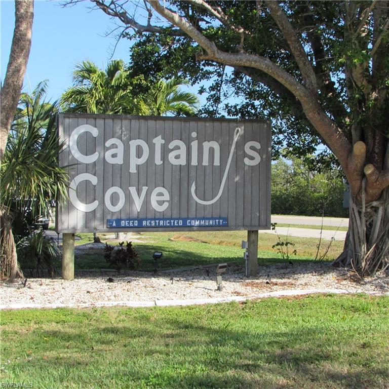 CAPTAIN'S COVE homesite in Bokeelia. Boating subdivision without having to pay waterfront taxes. This lot is on a cul de sac and is larger than most lots. There are 2 contiguous lots (each $89,900) for a GREAT OPPORTUNITY TO OWN .5 +/- ACRE IN A SOUGHT-AFTER SUBDIVISION. Captain's Cove has a private sewer system, community boat ramp with direct access to Charlotte Harbor, Pine Island Sound and the Gulf. This lot has access from Quail Trail also for easy pull through. Build you dream home TODAY!!