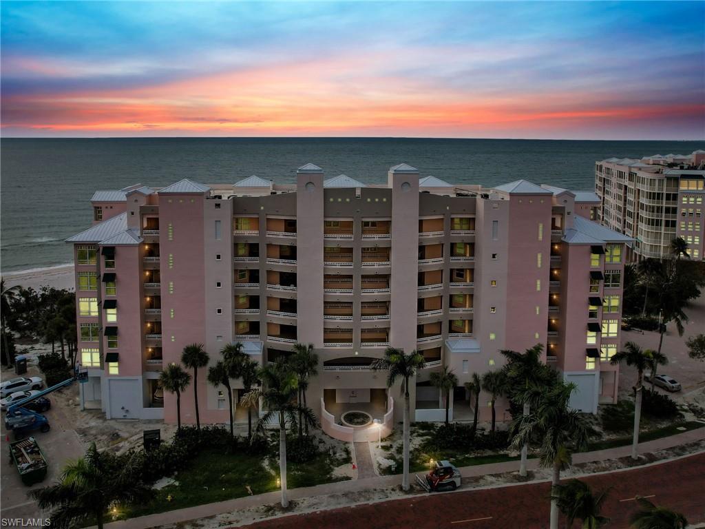 Boasting panoramic southern and western views of the Gulf of Mexico, this penthouse offers an unparalleled experience of coastal living. This is the first time this penthouse has been offered on the market! With over 2400 sqft, this residence has exclusive access to the beach, creating the perfect blend of tranquility and seaside living. Step onto your private terrace and bask in the coastal breeze while enjoying sunsets over the the ocean, making it an ideal setting for relaxation and entertainment. You’ll find Gulf and Bay views from almost every window, spanning from Naples to Sanibel. Offered turnkey furnished, this 3 bedroom, 2.5 bath is move-in ready with upgrades like plantation shutters, crown molding, 12 foot ceilings, and electric hurricane shutters on the lanai. There is access to a range of amenities, including a swimming pool and spa, renovated fitness center overlooking the water, clubhouse room, and private Club at Barefoot Beach memberships available. Seize this rare opportunity to experience the epitome of coastal living, where the rhythm of the waves becomes your daily soundtrack, and every sunset is breathtaking.