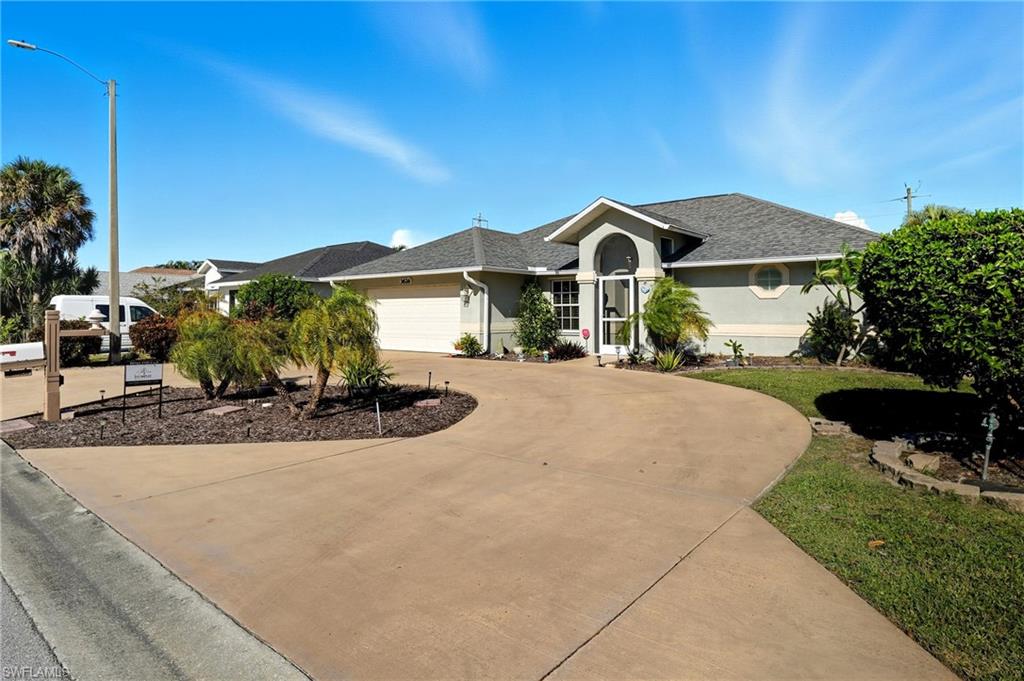 New Price and LOW HOA! Welcome to this beautifully maintained home in the highly desirable community of Queens Park, where comfort, convenience, and Florida living come together. Situated on a quiet street with peaceful greenspace views, this inviting residence offers a relaxed lifestyle just minutes from everything Naples has to offer. A spacious circular driveway provides ample parking and welcoming curb appeal. Inside, the light-filled floor plan is designed for both everyday living and entertaining, featuring multiple gathering spaces including a formal living and dining area, along with an additional family room adjacent to the kitchen. Outdoor living takes center stage with easy access to the private screened lanai from multiple areas of the home. Whether enjoying your morning coffee or hosting friends and family, the eastern exposure fills the outdoor spaces with beautiful sunrise views and gentle morning light. Ideally located just a short drive from downtown Naples, Gulf beaches, Marco Island, shopping, dining, golf, and everyday conveniences, this home offers exceptional value in one of Naples’ most established communities. With a low HOA and an unbeatable location, this is an outstanding opportunity to enjoy the Southwest Florida lifestyle at an attractive price point. Florida living starts here in Queens Park.