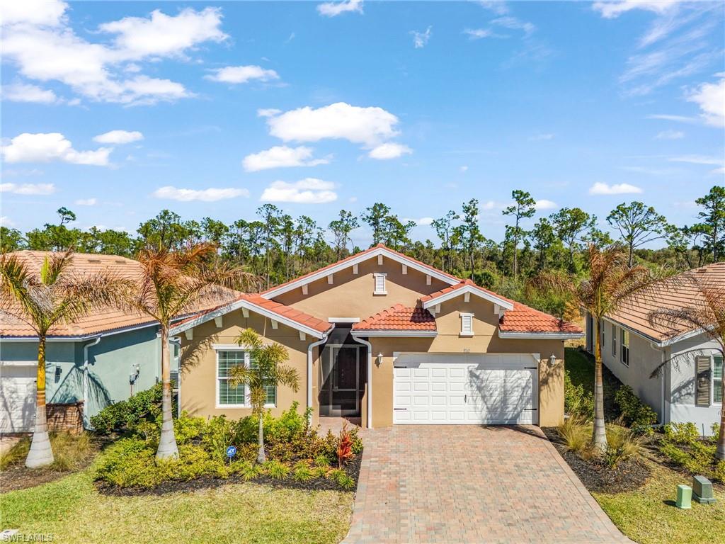 Bring your Golf clubs, make friends, enjoy sunshine! Large newly built and already improved executive home with exceptional PRESERVE VIEWS! Flood zone X, no flood insurance required. With 3 bedrooms and a den, over 2200 square feet of living space, 2 full baths and a half-bath, oversized 32 feet deep 2.5 car tandem garage, generous size covered and screened lanai, plus 16x40 open pavered patio on the back overlooking preserve - this home truly has room for everything and everyone. East exposure on the back allows you to enjoy morning sun on your patio while giving you much needed shade in the afternoons. Built in 2024 this "Shelby" model of Tradition series by DR Horton is no longer built in this community and comes with storm glass and doors, 9-foot ceilings, 8-foot door frames, 6 inch baseboards, upgraded cabinetry, granite counters, tray ceilings and unique features like laundry room accessible from both main walk-in closet and the hall. Recent updates include widened driveway, screened front porch, generator plug-in, surge protection, security system, gutters all around, rust guard with soft start and UV light for AC, utility tub in garage, plantation shutters in dining area, electric roll down blind for oversized 3-sectional sliding glass door in the living room, blinds on all other windows, upgraded lights and fans. Magnolia Landing is amenities rich community, offering two swimming pools, pickleball, bocce ball and shuffleboard courts, fitness center, and many miles of sidewalks for safe walking. Social calendar includes many community events. Magnolia Landing Golf Club boasts Gordon Lewis-designed championship course featuring over 7,200 yards and 6 sets of tees, with optional membership or pay-as-you-play options. The Golf Club features an onsite restaurant and bar. Low HOA fees cover lawn care, landscaping, irrigation, bulk cable and internet. Make this exceptional home your permanent residence of a winter escape! Schedule your showing today.
