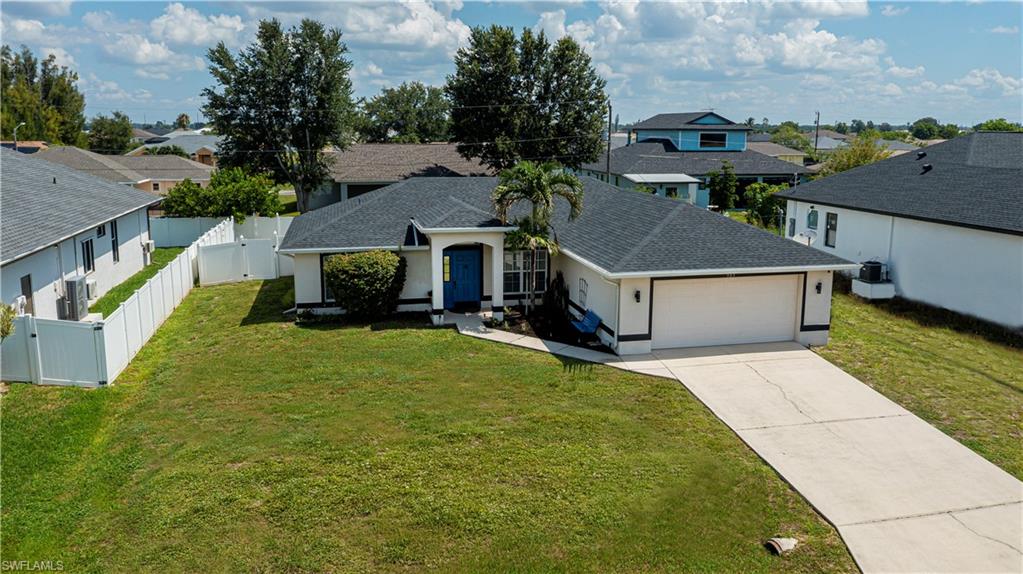 Move-in ready 3-bedroom, 2-bath home offering 1,557 square feet of comfortable living space in a desirable North Cape Coral location. NOT LOCATED IN A FLOOD ZONE AND NO FLOOD INSURANCE IS REQUIRED!  Featuring a new roof in 2023 and a brand-new air conditioning system, many of the major updates have already been completed for the next owner.  July 2026 - both guest bedrooms freshly painted.
Inside, you'll find tile flooring throughout—no carpet—and a bright, open layout that feels spacious and inviting. The kitchen flows seamlessly into the living and dining areas, creating an ideal space for both everyday living and entertaining.
Step outside to enjoy the fully fenced backyard with durable vinyl fencing, providing privacy and plenty of room for pets, outdoor gatherings, gardening, or even a future pool.
Conveniently located near Diplomat Elementary and Diplomat Middle School, this home also offers easy access to shopping, dining, parks, and everyday conveniences.
With major updates already completed, a private backyard, and room to grow, this property offers an exceptional opportunity to enjoy the Florida lifestyle.