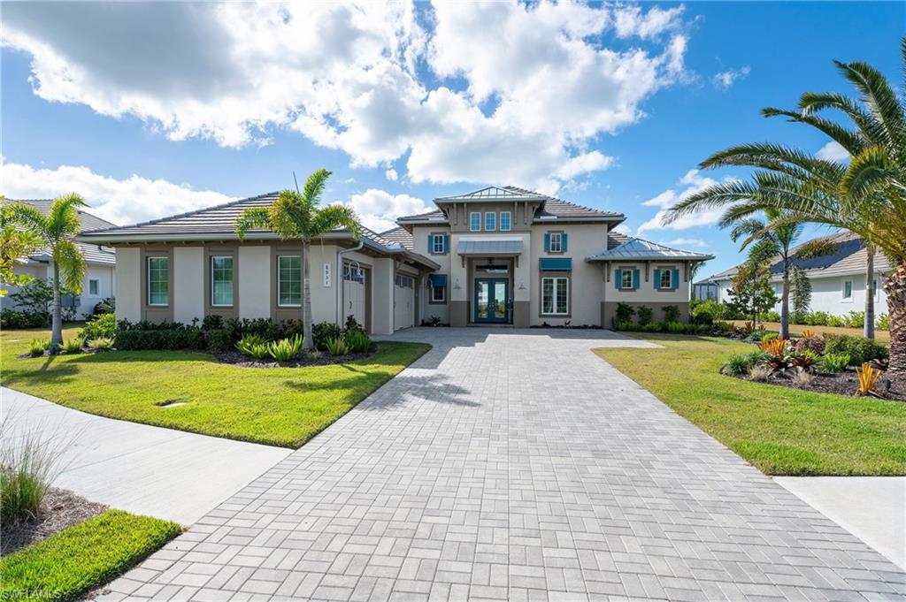 Price drastically reduced, the BEST VALUE LUXURY home with THE MOST UPGRADES (over $500,000 after the builder) in The Isles of Collier Preserve! This magnificent FURNISHED POOL and SPA home with breathtaking PRESERVE views is truly a showplace and will impress even the pickiest buyers. Built by famous STOCK builder, highly desirable Cocoplum floorplan with over $500,000 spent in upgrades. This stunning LUXURY home is perfect for those who like privacy. The preserve is extremely unique, you've never seen anything like this, it's like being on safari. Must see this to truly appreciate it's beauty. Highly coveted Southwest exposure for breathtaking sunsets. ENTERTAINER'S DREAM home with an open concept floor plan, tons of natural light, chef's dream kitchen & LUXURY OUTDOOR LIVING. Soaring ceilings and enormous light filled glass sliding doors for that airy feel. Large living room with custom built-in shelves and cabinets, fireplace, coffered ceiling, dining area with built-in bar, two wine coolers and zero corner glass sliders. Stunning chandeliers throughout. Majestic office/den with custom built-in shelves and cabinets. Your divine and private master suite includes two walk-in closets with custom built-ins, a walk-in shower, gorgeous tub and dual sinks. Master bedroom is located on the side of the home and walks out to the lanai, perfect for your morning coffee. Each guest bedroom has its private bathroom for your guest's comfort. Gourmet chef's kitchen with lots of cabinets, huge island, breakfast bar, two walk-in pantries, gorgeous backsplash and gas stove. The amount of covered and uncovered outdoor space is unreal, allowing you to enjoy being outside all year round. Outdoor area will impress you with large outdoor kitchen with an island. Saltwater pool and spa with waterfalls overlooking vast preserve. This majestic home with LUXURY UPGRADES GALORE and beautiful decor will sure impress you as soon as you will walk in through the front door. Feel like you are on vacation with resort style amenities in this lively extremely desirable community. Short walk to Cypress Waterway and beautiful NATURE TRAILS. Isles of Collier Preserve has it all! Lakeside dining at the Overlook Bar & Grill, 2 pools, even a dog park. You can stay in shape playing tennis, pickleball, bocce ball, swimming laps, working out in the fitness center, hiking and biking on 7+ miles of trails, paddle boarding, kayaking on the Cypress Waterway. If you are looking for a larger boating experience, The Isles adjoins Hamilton Harbor, a magnificent marina and club located right on Naples Bay! This exclusive community is only minutes away from historic downtown and gorgeous Naples beaches.