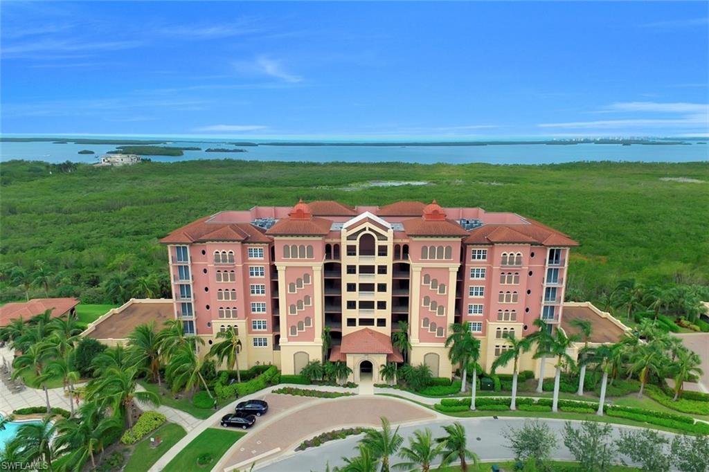 Rare opportunity to own a top floor end-unit in Castella at The Colony Golf & Bay Club. Offered fully furnished, this residence boasts magnificent views of the Gulf of Mexico and our fabulous Florida sunsets. Offering an open floor plan and large room sizes, this 3 bedroom/3.5 bath unit also has a spectacular open kitchen with center island, light and cheery breakfast nook, dining area in front of the western facing wall of windows, and one of the largest wrap around lanais offered in The Colony condominiums. Your guests will appreciate one of the two private en suite guest bedrooms, complete with breathtaking views. Castella is located deep within the Colony, assuring peace and tranquility while being within walking distance to the residents-only Bay Club restaurant. Colony residents enjoy the 34-acre private beach island with free boat shuttle, boating/sailing lessons, multiple canoe/kayak parks, community center with full service fitness center, tennis, bocce, pickle ball, and more. Optional golf/club memberships allow access to the community pool, full service spa, 18-hole Jerry Pate golf course and golf clubhouse. Top floor end units rarely come on the market so call today!