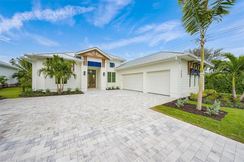 **This is a pre-construction purchase agreement. Expected completion Sept 2027** Welcome to Coconut Landing, a gated coastal contemporary new construction community of just 25 single family homes - WEST OF US-41, ELEVATED to "X" FLOOD ZONE! // 4560 Seagrove will be a 3-car garage Palm plan. Home features will include a Generac Natural Gas 26kw generator, standing seam metal roofing, impact windows & doors throughout, 12' ceilings throughout (14' vaulted great room ceiling), 10' pocket sliders, walk-in pantry, and an open concept main living area leading to three bedrooms with walk-in-closets (dual WIC's in the primary suite), office, and three bathrooms. Material features will include Pompeii quartz countertops, white oak flooring, Bosche appliances, and Kith cabinetry the kitchen.  // Welcome to Coconut Landing, a new construction community west of US41 in Estero. Outdoor living features will include a stone pool deck and heated salt swimming pool and spa. // AMENITIES & MEMBERSHIP: The following amenities listed are at the Hyatt Regency Coconut Point and Spa approximately 1/4 mile from Coconut Landing: lap pool, adult pool, lazy river, restaurants, fitness, spa, sauna. Coconut Landing residents enjoy a free one-year membership to the Regency Hyatt Coconut Point Resort and Spa, with the option to renew thereafter (no obligation; membership is $8,500/year for up to 5 household members; see supplements, subject to change). This membership does not include access to the private Pelican Landing beach park. HOA DUES include common area landscape, fenced pet play area, high speed 980mbps CenturyLink (Quantum) internet, keypad gated community entry, street lighting PLUS weekly cleaning and chemical balance of homeowner swimming pool and spa, weekly homeowner landscape maintenance, lawn irrigation, and exterior landscape pest control.  // 2025 Tax value reflects lot value only due to pre-construction status (Lee County Property Appraiser)  //