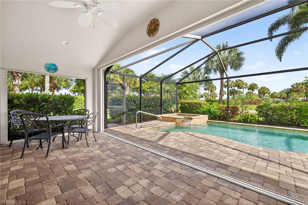 Enjoy the Florida lifestyle in this 3 Bedroom, 2 Bathroom pool home located in the highly sought-after golf course community of Colonial Country Club. Situated on an oversized corner lot with tropical landscaping, peaceful lake views, and no neighboring home on one side, this property offers added privacy and a relaxed setting designed for making the most of Southwest Florida's sunshine and outdoor living.  Inside, you'll find spacious room sizes, soaring 10-foot vaulted ceilings, and crown molding throughout. New luxury vinyl plank flooring extends through the living areas and bedrooms, while tile flooring adds durability and convenience in the kitchen and bathrooms. The kitchen is well-equipped with new stainless steel appliances, recessed lighting, and under-cabinet lighting, creating a bright and inviting space for both everyday meals and entertaining.  Step outside to your private screened lanai where a sparkling pool and spa overlook the lake, providing the perfect spot for morning coffee, afternoon relaxation, or evenings spent enjoying Florida's beautiful weather. Accordion hurricane shutters offer added convenience and peace of mind.  Beyond the home, Colonial Country Club offers an exceptional lifestyle centered around its 18-hole championship golf course designed by renowned architect Gordon Lewis. This property includes golf privileges, allowing you to enjoy one of Southwest Florida's premier golfing experiences. Residents also enjoy beautifully maintained grounds, tennis and pickleball courts, a fitness center, clubhouse dining, walking paths, and a full calendar of social activities and events. As an added benefit, the community's special assessments have been paid in full, providing additional value and peace of mind for the new owner.  Whether you're looking for an active lifestyle or a peaceful retreat, this home offers the best of both in one of Fort Myers' most desirable gated communities.