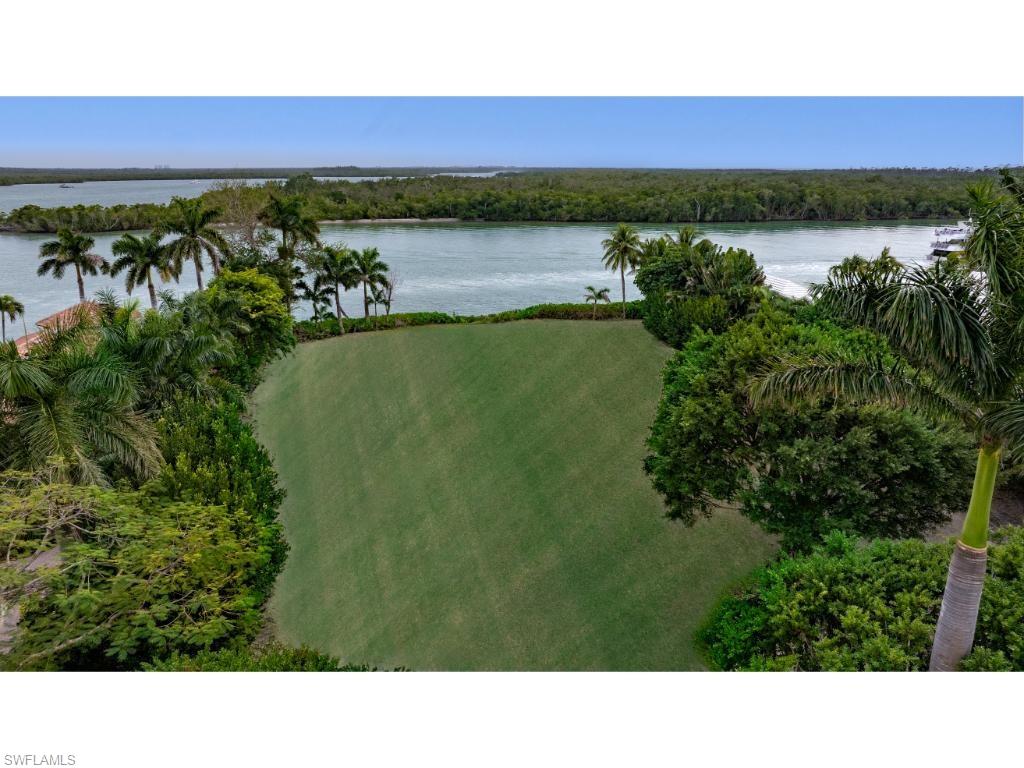 If all of the properties in Port Royal were available, this one and one-half Port Royal lot site would be one of the first chosen. In fact, the property has been owned by the family of the developer of Port Royal for many years. With environmental views across the wide waterway of Admiralty Bay, the property is not far from Gordon Pass and the Gulf of Mexico and just a short distance to the inland waterways leading to some of the most pristine estuaries in the United States. Because of its size, the property will accommodate a large building envelope.  Just a few miles to the north are the famous restaurants, shopping districts, and centers for the arts, for which Naples is internationally known. Port Royal Club eligibility. The Club’s state of the art fitness and tennis centers are nearby. Truly the perfect dimensional property and location to build one’s dream home. Enjoy the quintessential life-style experience that only Naples can offer.