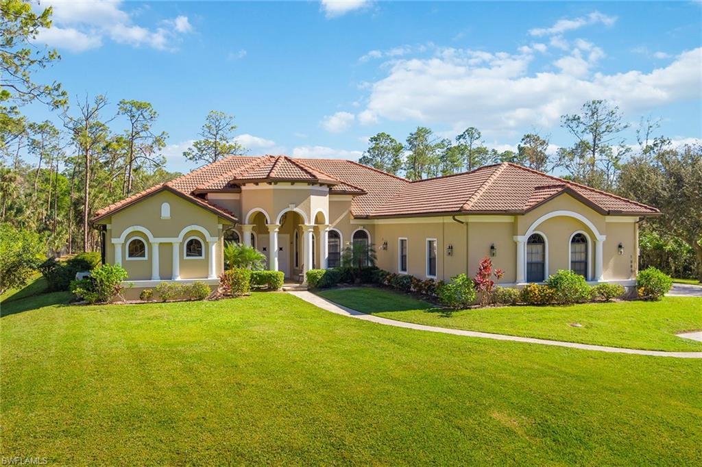 Don’t miss this idyllic estate home that can be used as one unique compound or two separate homes - perfect for multi-generational living or large extended family gatherings. Enjoy plenty of privacy with an expansive tree-lined lot and a gated driveway. This impeccable 9-bedroom + guest house has it all. The open-concept living area provides glass doors that allow a seamless flow to your backyard paradise. Sure to delight the avid cook, 2 gourmet kitchens indulge you with top-notch stainless steel appliances, handsome cabinetry, and gleaming granite countertops. This residence boasts 2 generous master suites with gorgeous en suites sure to impress. The additional well-sized bedrooms await your family or overnight guests. The screened lanai is an excellent place to have a family gathering where you can enjoy a dip in the shimmering pool or a nice relaxing soak in the spa. Other amazing details include a whole house reverse osmosis system, volume ceilings, elaborate millwork, and so much more. Don’t miss the guest house with a carport. This home has too many amazing features to list. Come call this incredible residence your own before someone else does!