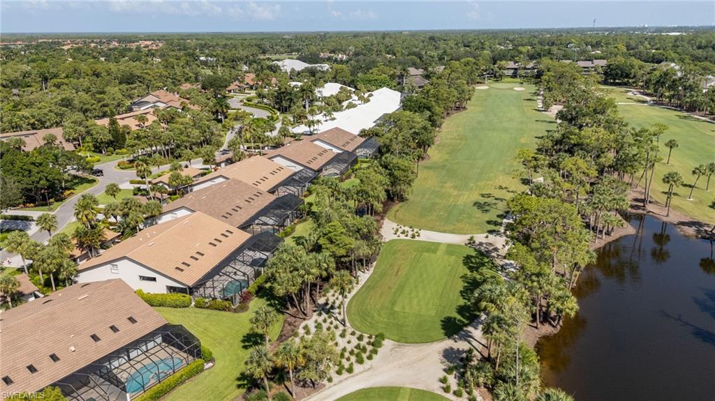 IMMEDIATE EQUITY GOLF MEMBERSHIP AVAILABLE. Welcome to your dream retreat at the prestigious Eagle Creek Golf and Country Club! This exquisite 3-bedroom, 3-bathroom villa is the epitome of luxury and comfort, perfectly designed to cater to your every need. As you enter, you are greeted by an abundance of natural light that flows through the open-concept living space, accented by warm neutral tones and elegant wood floors throughout the main living areas. This villa is thoughtfully furnished in a turnkey style, creating an inviting atmosphere that makes you feel right at home from the moment you step inside. The spacious living room seamlessly connects to the gourmet kitchen, which boasts modern appliances, ample storage, and a breakfast bar that’s perfect for casual dining. This space is ideal for entertaining family and friends, allowing you to enjoy each other’s company while taking in the breathtaking views of the golf course. Each of the three bedrooms is designed with comfort in mind, featuring plush carpeting in the guest bedrooms and a serene master suite that offers privacy and tranquility. The three bathrooms are beautifully appointed each with their own bath, ensuring that both residents and guests feel pampered. One of the standout features of this villa is the oversized lanai  and pool area, which beckons you to unwind and enjoy the Florida sunshine. Step outside to discover your own personal oasis, complete with a sparkling pool that’s perfect for cooling off on warm afternoons. You’ll be captivated by the stunning views of the 3rd and 4th holes of the renowned Eagle Creek Golf Course, enhanced by a tranquil water feature that creates a serene backdrop for your outdoor gatherings.
Additionally, the villa includes a convenient two-car garage, providing ample space for your vehicles, gear and golf cart. Whether you’re an avid golfer or simply seeking a luxurious lifestyle in a picturesque setting, this villa at Eagle Creek Golf and Country Club offers the perfect blend of elegance, comfort, and recreational opportunities- golf, PICKLEBALL, tennis, bocci, multiple dining and entertaining areas. Don’t miss your chance to make this stunning property your own and embrace the extraordinary lifestyle it has to offer!