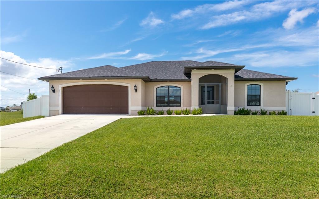 Cape Coral Charmer with a Pool, Spa & Shed Full of Possibilities! Welcome to your Florida dream home! This 3-bedroom + den, 2-bath beauty has serious curb appeal, a fresh new 2023 shingle roof, and a whole lot of personality. Step inside to a bright, open floor plan with soaring ceilings, granite countertops, and a kitchen that’s ready for everything from charcuterie night to pancake Sunday. The dining area flows beautifully into the heart of the home, and the bonus DEN makes a perfect office, playroom, or glam room (you decide)! The primary suite is spacious and serene with a spa-like ensuite featuring a soaking tub, double vanity, and a large walk-in shower. The guest bathroom opens straight to the pool—because no one wants wet feet running through the house! Now, let’s talk about your "backyard oasis". The "custom pool and spa" (added in 2019) are the stars of the show. Whether you're sunbathing with a mimosa or soaking under the stars, this lanai is built for good vibes only. Grill, dine, watch the game, or just lounge—it’s all here, and it’s all screened-in for max comfort. Need storage or a creative escape? There's a "shed out back" perfect for tools, toys, your secret hobby, or turning into the ultimate clubhouse—man cave, she-shed, or kid’s kingdom. You name it. **Bonus Perks:** *New whole-house water softening system * Gorgeous tile throughout * Indoor laundry room * Fully fenced yard for privacy * Attached 2-car garage with style Tucked away in a quiet Cape Coral neighborhood, this home is close to shops, dining, schools, and all the sunshine-filled fun Southwest Florida is known for. So go ahead—dive in (literally). This home is ready for its next adventure. Is it you??? Schedule your private tour today before it’s gone!