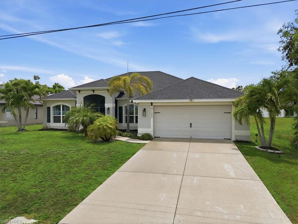 Welcome to 4122 NE 20th Court in beautiful Cape Coral, Florida! This meticulously maintained 4-bedroom + den, 2-bath pool home offers 2,330 square feet of spacious living and was built in 2017. Situated in a desirable Northeast Cape Coral location, this property combines modern construction, an open-concept design, and the peace of mind of being located in a non-flood zone. The home sits on an oversized lot and features highly sought-after southern rear exposure, providing abundant natural light throughout the day and ideal sun exposure for enjoying the pool year-round.

Inside, you'll find a thoughtfully designed split-bedroom floor plan with a versatile den perfect for a home office, media room, or guest space. The spacious kitchen opens seamlessly to the living and dining areas, creating the perfect setting for entertaining family and friends. High ceilings, generous room sizes, and modern finishes enhance the home's comfortable and inviting atmosphere.

Step outside to your private backyard oasis featuring a sparkling screened pool and expansive lanai, ideal for relaxing, dining outdoors, or enjoying Southwest Florida's famous sunshine. The southern exposure maximizes pool enjoyment throughout every season.

Built in 2017 with modern construction standards, this home offers energy efficiency, lower insurance costs, and contemporary design elements buyers are looking for today. Conveniently located near shopping, dining, schools, golf courses, boating, and all that Cape Coral and Southwest Florida have to offer.

Property Highlights:
• 3 Bedrooms + Den
• 2 Bathrooms
• 2,330 Sq Ft Living Area
• Built in 2017
• Southern Rear Exposure
• Screened Pool & Lanai
• Open Concept Floor Plan
• Split Bedroom Design
• Non-Flood Zone Location
• Modern Construction
• Spacious Lot
• Move-In Ready

Don't miss this exceptional opportunity to own a newer pool home in one of Cape Coral's fastest-growing areas. Schedule your private showing today!