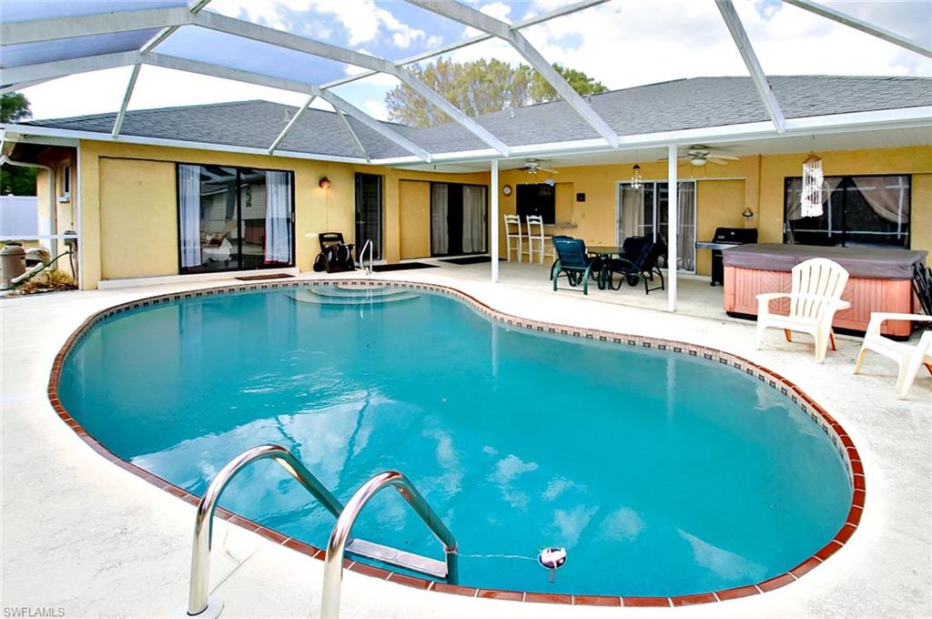 Spacious Pool home with Southern exposure. Features include granite counters, stainless appliances, lots of counter space including a breakfast bar,  new washer and dryer is almost new. There is ceramic tile and laminate throughout the home. Bedrooms are spacious and each bedroom has walk-in closets. There are sliding glass doors from the living room, family and two bedrooms  This is a split bedroom floor plan with living room/dining area and a nice size family room. The furniture is negotiable This home has been re-piped and the AC was replaced in 2016. 
All assessments are paid in full, the community has sidewalks, bike paths, parks and a fire station near by.