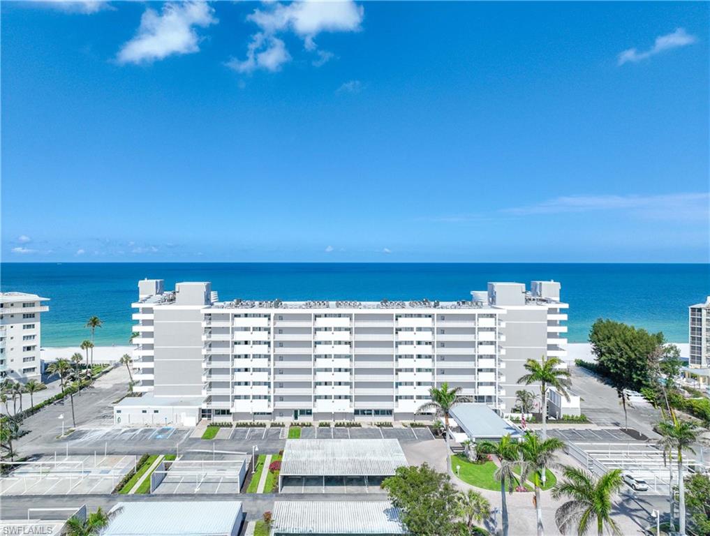 Beachfront! 2 bedroom-2bath, 7th floor condo, overlooking The Gulf of Mexico, Courtyard, and Pool. Located directly on Moorings/ Park Shore Beach where you are just an elevator ride away to toes in the sand. Tastefully designed, tile throughout, and spectacular Sunset views from the living room, master bedroom and balcony. Laundry room and trash chute on each floor for your convenience. Available short or long term. 

Amenities include a large beachfront pool, barbecue area, shuffleboards and kayak/ paddleboard storage. The lobby, library, gym, 2 guest suites, and community room with billiards and full kitchen, all overlook the white sandy beach and peaceful waves. Enjoy the beachfront lifestyle, just a short walk north is renowned shopping and dining at Venetian Village, where you can rent a boat with quick access to the Gulf.