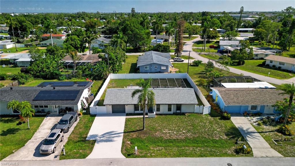 Not in a flood zone and with no HOA or deed restrictions, this pool home in the heart of South Fort Myers offers the freedom and location many buyers are searching for. Situated in The Fort Myers Villas, you're just minutes from the Bell Tower Shops, restaurants, parks, schools, Gulf beaches, I-75, and Southwest Florida International Airport. Major updates have already been completed, including a new roof (2023), new pool cage (2023), complete HVAC system (2020), whole-house replumbing, newer water heater, vinyl privacy fence with double gate access, and a brand-new washer and dryer. The home is also pre-wired for Quantum Internet. Inside, crown molding runs throughout the home, and the primary suite features a walk-in closet and an updated bathroom with a large walk-in shower. Outside, the fenced backyard provides plenty of space for pets, outdoor activities, or simply enjoying the pool in privacy. Additional features include a single-car garage and an oversized driveway with ample parking. With the major systems updated and an unbeatable South Fort Myers location, this home offers a great opportunity for full-time residents, seasonal owners, or investors.