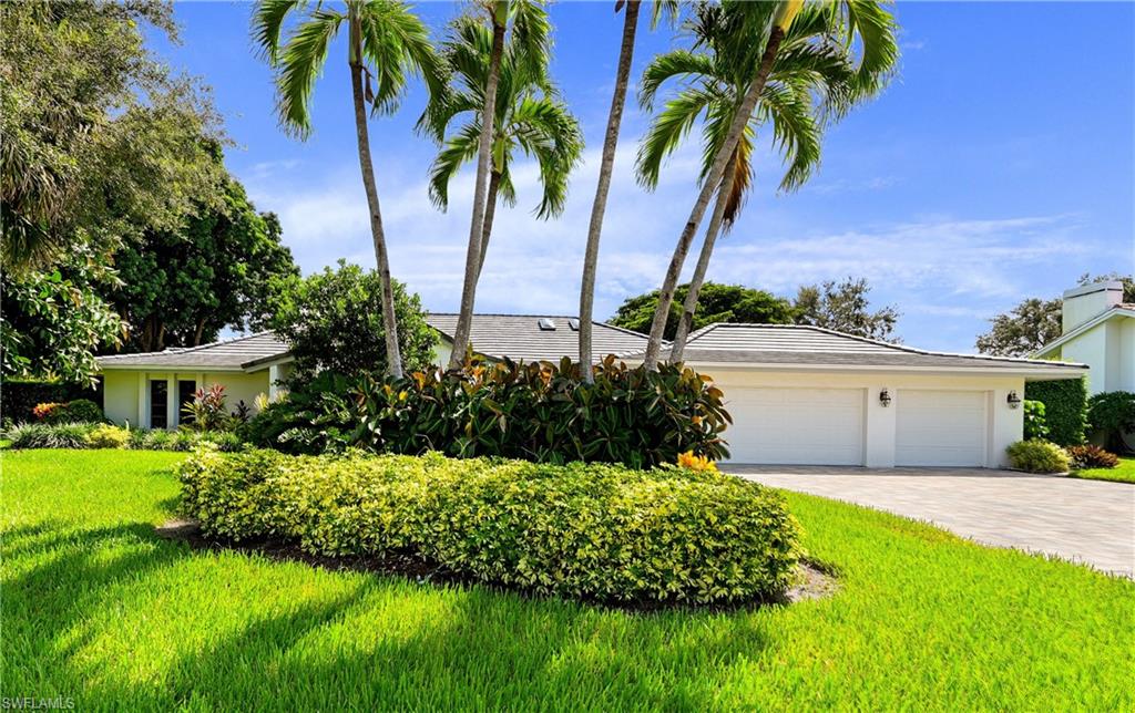 Lovely location in the heart of Pelican Bay. This home is ready for upgrades. Features include volume ceilings, split bedrooms, three car garage, new roof, spacious screened Lanai with large pool over looking a large yard with beautiful Florida fauna and trees. Pelican Bay offers resort style living, with private access to 3 miles of pristine beach, beach services and restaurants, bike and jogging paths, tennis, and a state of the art fitness center. It is bordered to the north by The Ritz-Carlton and to the south by the upscale Waterside Shops and Restaurants.