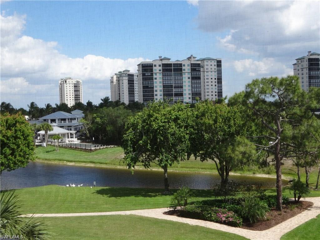 HUGE PRICE REDUCTION! SELLER WANTS AN OFFER! 4th floor location, lovely water views and ready-to-move-into condo has newer appliances and A/C (in past 3 years), is newly painted and has a lovely Great Room concept.  This home is turnkey furnished and even comes with 2 bicycles so you can bike to the beach and enjoy the Florida Lifestyle! Split bedroom floor plan; guest suite has twin beds and Plantation shutters. The Master Suite is a generous size with Plantation shutters, sliders to the lanai, dual vanities in the bathroom and a very large walk-in closet! Relax and enjoy the terrific Princeton Place pool-a wonderful area to swim, enjoy the sun and chat with your family and friends! the community has 24 hour security. CLUB Membership is included with this home! The new owner will be required to pay the Club a transfer fee.  Located in N. Naples, West of US 41, close to the beaches, local shops, restaurants.