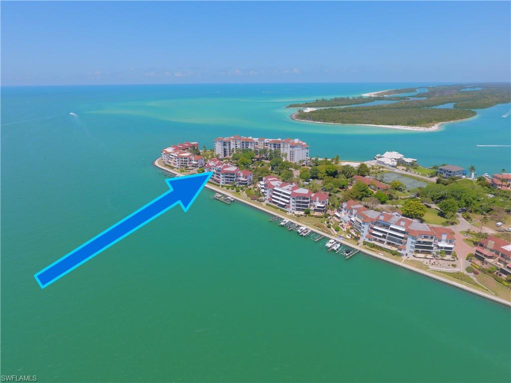 Welcome to Paradise! This lovely condo is located on the tip of Isles of Capri, in the beautiful La Peninsula. Rarely available, this top floor, Cote d'Azur floor plan has Two bedrooms, two and a half bathrooms, 1,750 sq.ft. under air and vaulted ceilings.  Features include Impact windows, sliders, wet bar and a spacious floor plan to name a few. La Peninsula is a gated community which has lush tropical landscaping through out, 4 har-tru tennis courts, Fitness room, club house, olympic-sized heated swimming pool, spa and a large promenade along the waters edge, which wraps around the whole point. Amazing, panoramic views of the Big Marco river, Hideaway beach and Marco Island. You will enjoy watching the boats pass by as the dolphins and manatees play, right from your living room. Isles of Capri is a tropical island that boasts and abundance of wildlife, four great restaurants and three marinas. Located one mile from Marco Island & only 20 minutes away from Downtown Naples with its sophisticated shopping & five star dining. Our area is famous for its white sand beaches, world class fishing & boating and fantastic golfing. Capri is the perfect place to sit back, relax and unwind.
