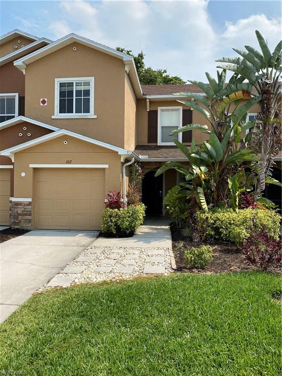 Nestled at the end of the cul de sac, this building boasts the most privacy in the community with low traffic and wooded preserve in the rear.  The under truss screened lanai, coupled with an open air paved patio makes for a quiet escape. Kitchen, living area, and half bath on first floor. Three spacious bedrooms and two full bathrooms upstairs. Master bath comes with shower and oversized bath tub! Garage, pantry, linen closet, laundry cabinets, and under stairs closet provides plenty of space for storage. Highlights: recently replaced air conditioner & water heater - LOW Association fee that includes water! - Roof insured by association. Best unit location in nature filled community! Watch Bald Eagles in their nest only steps away and catch big bass right out of the community lakes. This gated community is a growing gem for anyone looking for a no hassle, maintenance free, quiet location. Minutes from I-75, Downtown Fort Myers, multiple nature trails, library, and recreation centers. Publix and multiple pharmacies within two blocks within walking distance. Enjoy the heated pool and well furnished clubhouse overlooking one of the community lakes.