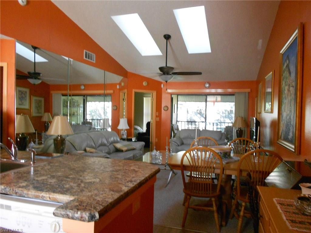 MOVE IN READY IN A GREAT LOCATION. This second floor, two bedroom, two bath condo is perfect for a second home or a year round home. The A/C is two years old and has a new ultraviolet light. The water heater is also two years old. It has new waterproof laminate flooring in some of the rooms. It has a new stainless steel refrigerator, stove and microwave. The kitchen has new wood cabinets and counter top with bar area. It has new skylights to let in the natural light. Both bathrooms have newer toilets. This community is close to the beaches, shopping, restaurants, Lakes Park and just a short drive to the airport. The community has a heated pool, spa, and tennis courts. There is a community boat ramp for canoes and kayaks. This is a MUST SEE.
