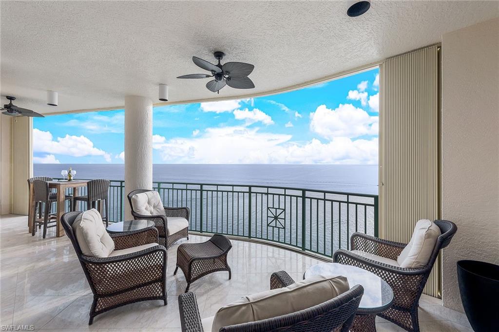 Summer living at its finest! Breathtaking sunsets and sweeping ocean and island views from this magnificent residence where luxury, comfort and coastal sophistication blend in a harmonious way. The private elevator opens to the welcoming foyer, followed by a formal living, dining room, massive views of the Gulf and a custom-made bar for endless happy hours. Superb architectural custom details and impeccable craftsmanship throughout. Gorgeous marble flooring, European custom-made furniture, exquisitely appointed. The inviting family room showcases a cozy fireplace and gourmet kitchen with rich cabinetry, gas stove, wine cooler and many traits to enhance your culinary experience. The elegant primary bedroom features phenomenal forever-wide water views, along with an impressive primary bathroom and the privacy of your own sauna for maximum relaxation. The large lanai is ideal for entertaining, relaxing and enjoying the boating activity, wild marine life, dolphins playing, the exotic birds flying by or just simply being mesmerized by the stunning and soothing scenery. Sold furnished, ready to move in. Exclusive private gated community with top notch amenities including theater, pool, social and exercise rooms, tennis, guest suites and more. Paradise found.