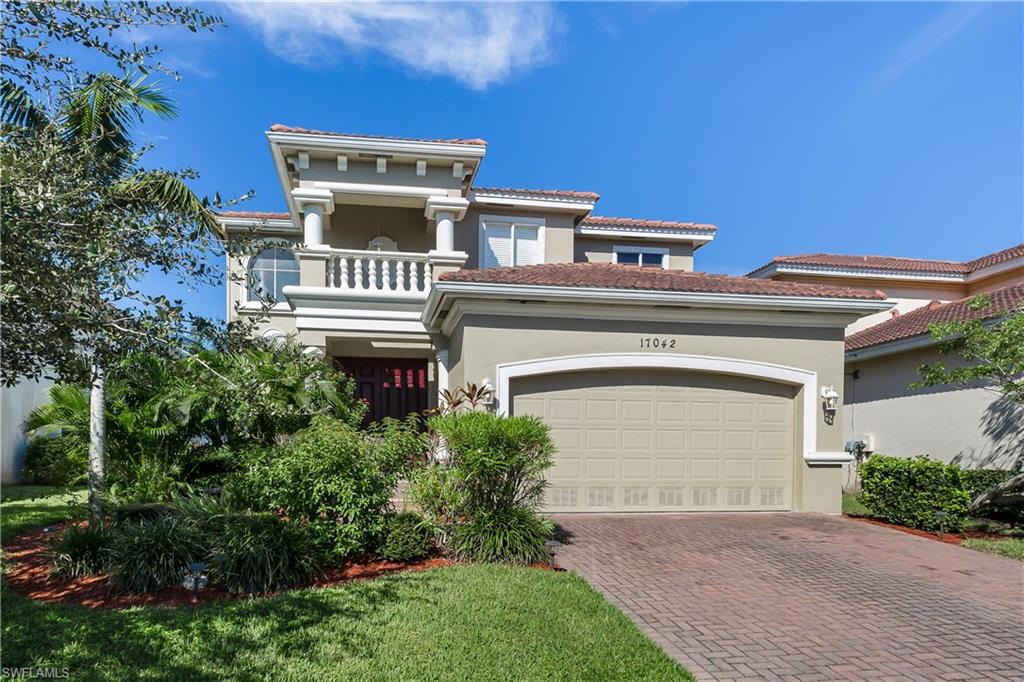 Elegant 4 bedroom, 3 bathroom home with lakeside fountain sunsets in sought after gated community of Catalina Isles. Fenced in backyard in pet-friendly community. Entertain your guests in your sprawling kitchen and dining areas, grill in your screened-in lanai and visit the community pool... or build your own! All bedrooms are upstairs with a split floor plan. Large master suite with walk-in closets, designer shower and his/hers sinks. Includes ample closet and storage space, central vacuum, high ceilings, granite counter tops, pavers on both driveway and lanai, epoxy garage floor and barrel tile roof. Close proximity to beaches, HealthPark hospital, shopping and restaurants. Convenient access to main roads and airport. A spectacular home that demands your immediate attention. Call your agent today for your private showing!