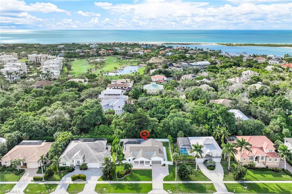This extraordinary Marco Island gem in the Tigertail Beach neighborhood was meticulously renovated in 2021, from the interior to the exterior. Nestled just 3 houses from the entrance to the prestigious Hideaway Beach enclave, this location offers both prestige & convenience. Tigertail Beach County Park is your gateway to the stunning coastline, just 1 mile away. Inside, you'll discover a wealth of high-quality finishes, fixtures, & appliances, ensuring that every room exudes elegance. The flooring boasts a lifetime warranty with a double layer of cushioning underlayment for your comfort. This home is not only aesthetically pleasing but also built to last, with Hardie Plank cement siding carrying a 30-year warranty. The expansive front & back porches are designed for easy access, featuring wide steps & a ramp. Elevated above the base flood elevation, this property offers security & peace of mind. New plumbing pipes & air ducts, impact-resistant windows, doors, & skylight, as well as closed-cell foam insulation within the walls & beneath the house, provide energy efficiency & soundproofing. Enjoy a resurfaced heated pool, new marble-tiled lanai, & wide screens in the brand-new lanai.